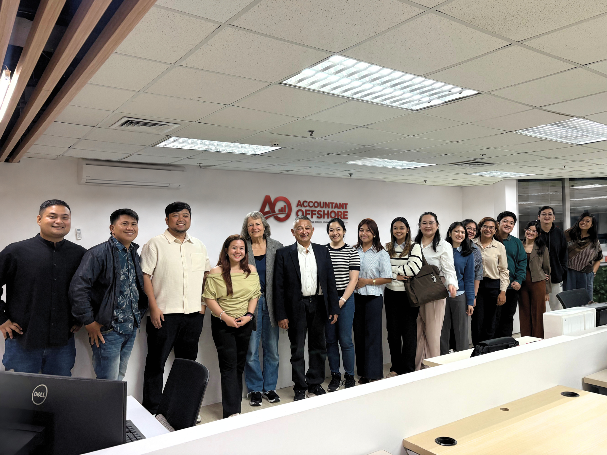 US CPA firm owner meeting with a 15-person offshore audit, accounting, and tax team at Accountant Offshore Inc. in the Philippines