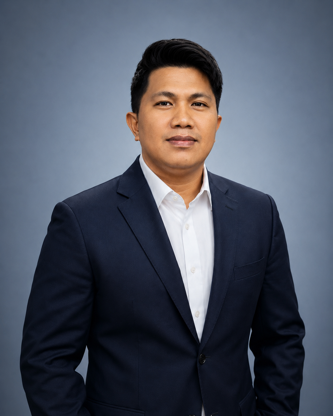 Accountant Offshore Inc. male leadership team member wearing a dark suit and white shirt.