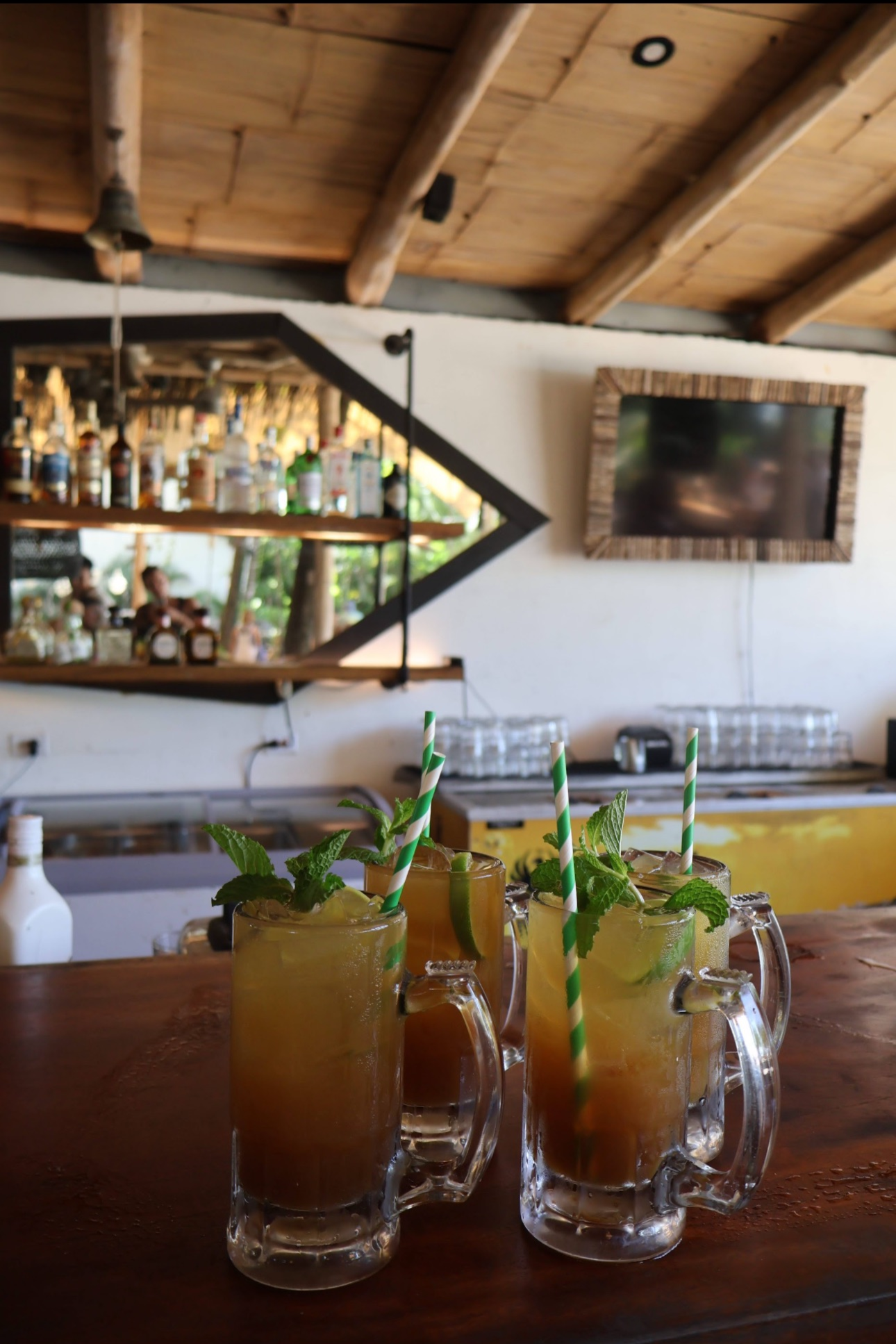 Signature cocktails served at an upscale restaurant and bar experience.