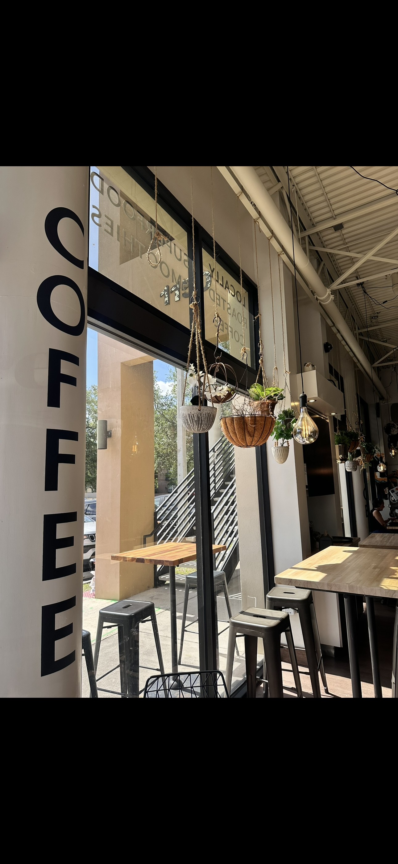 Boutique coffee shop interior with modern seating and hospitality focused branding content