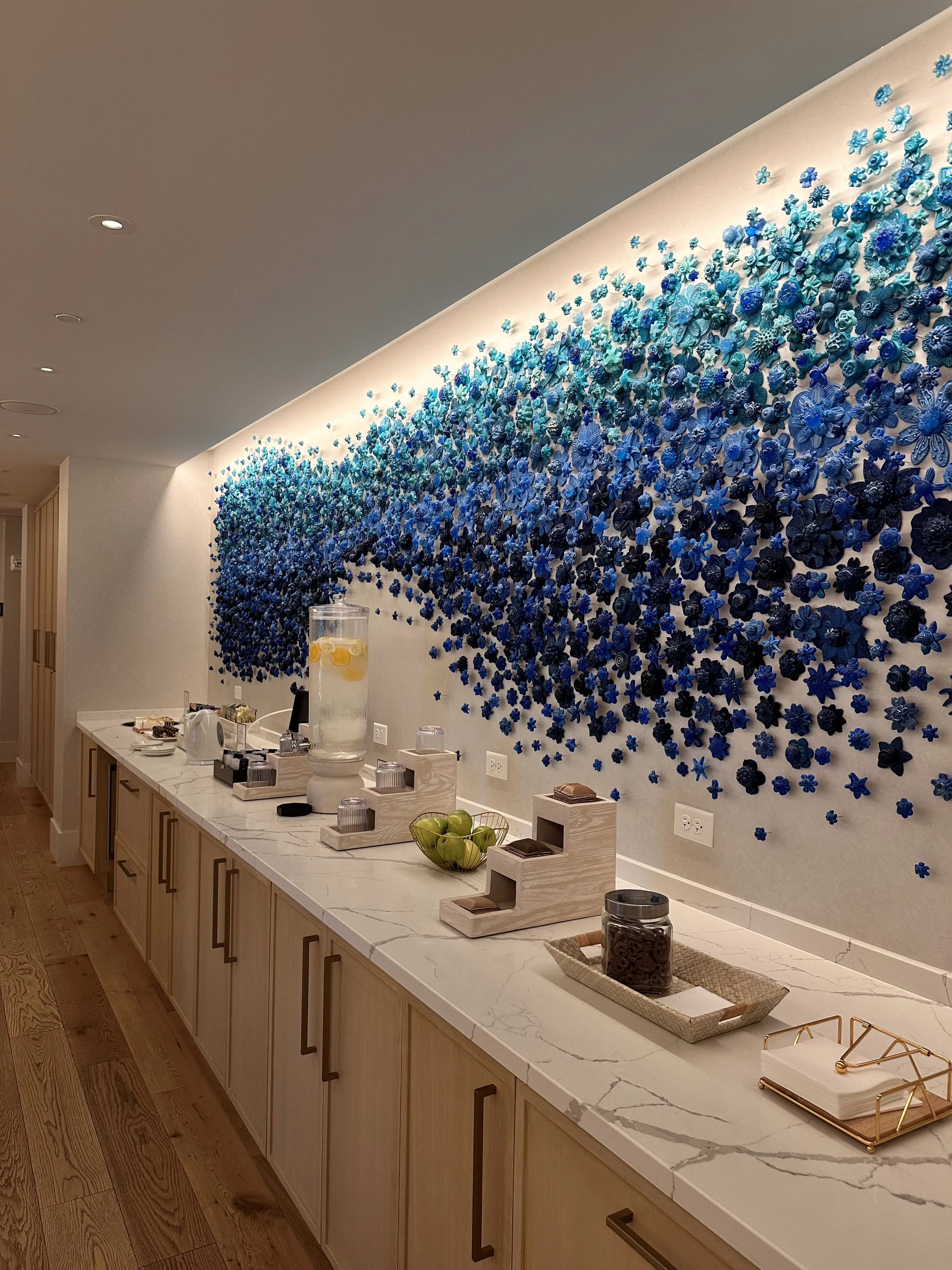 Luxury wellness space overlooking the ocean with modern architecture and relaxing atmosphere.