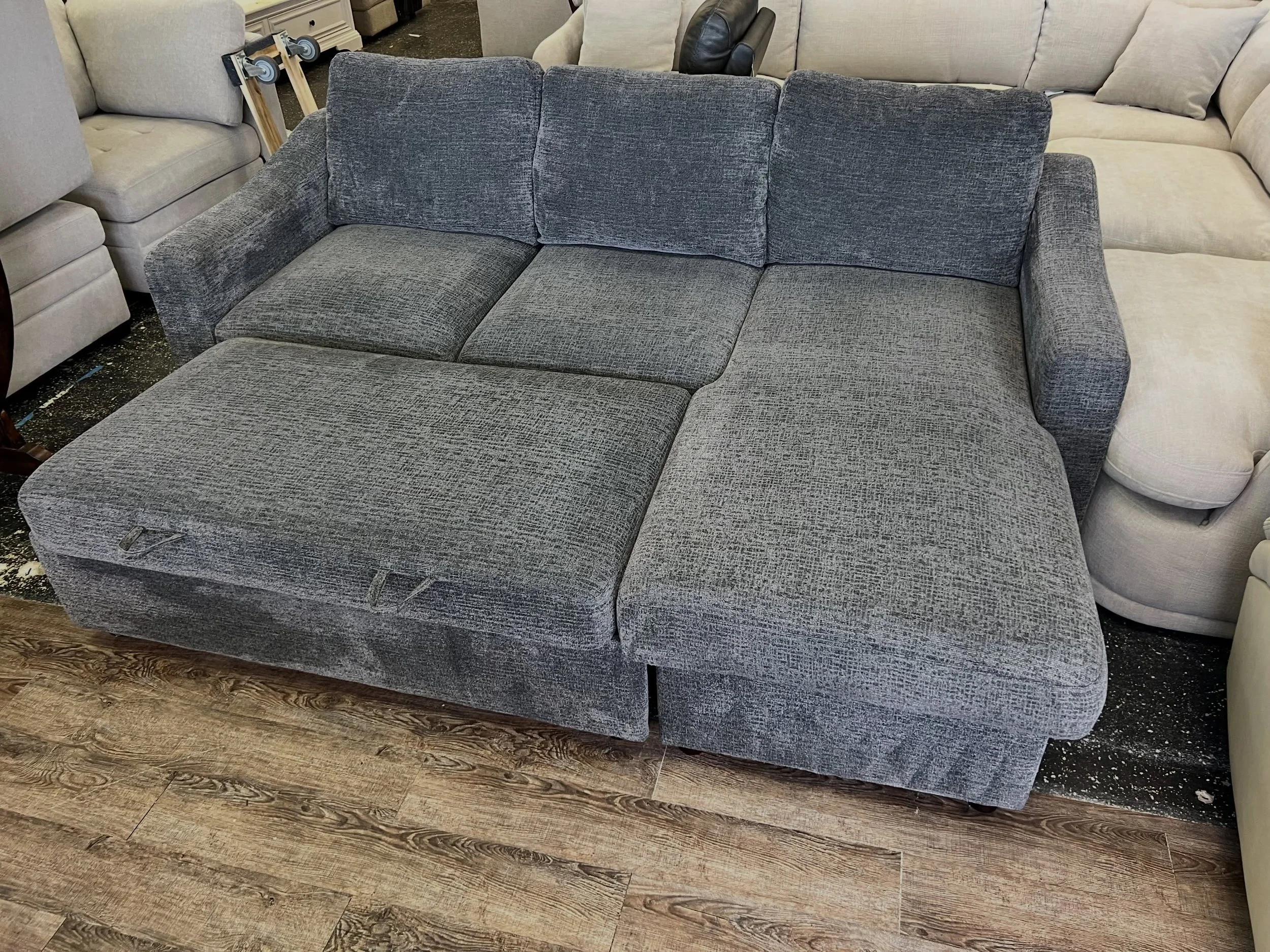 JUST ARRIVED &mdash;half off retail price😳🦏

Gray Fabric Sofa Chaise w/Pullout Sleeper.
✅Great Condition 
📏 89&rdquo; x 65.5&rdquo; x 37.5&rdquo;H
💲649

Rhino Decor
📍 13393 W Colonial Dr, Winter Garden, FL 34787
🕙 Tue&ndash;Thu 10&ndash;5 | Fri
