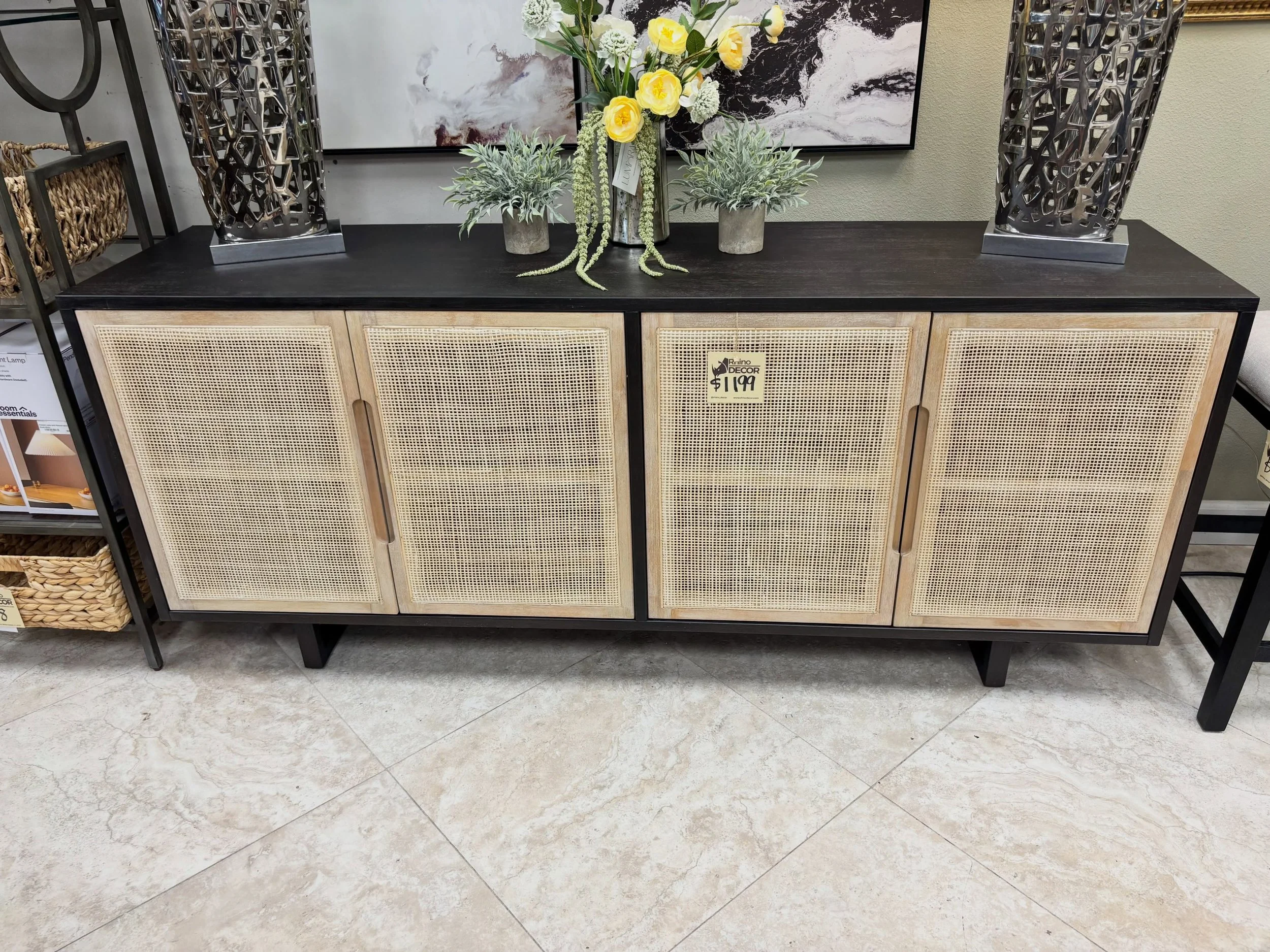 JUST ARRIVED &mdash; another great find at Rhino Decor 🦏

Nephie 72&rdquo; Black Cane Front Sideboard 
✅ New Condition, Open out of Box
📏 72&rdquo; x 18&rdquo; x 31&rdquo;H
💲1199

Rhino Decor
📍 13393 W Colonial Dr, Winter Garden, FL 34787
🕙 Tue&
