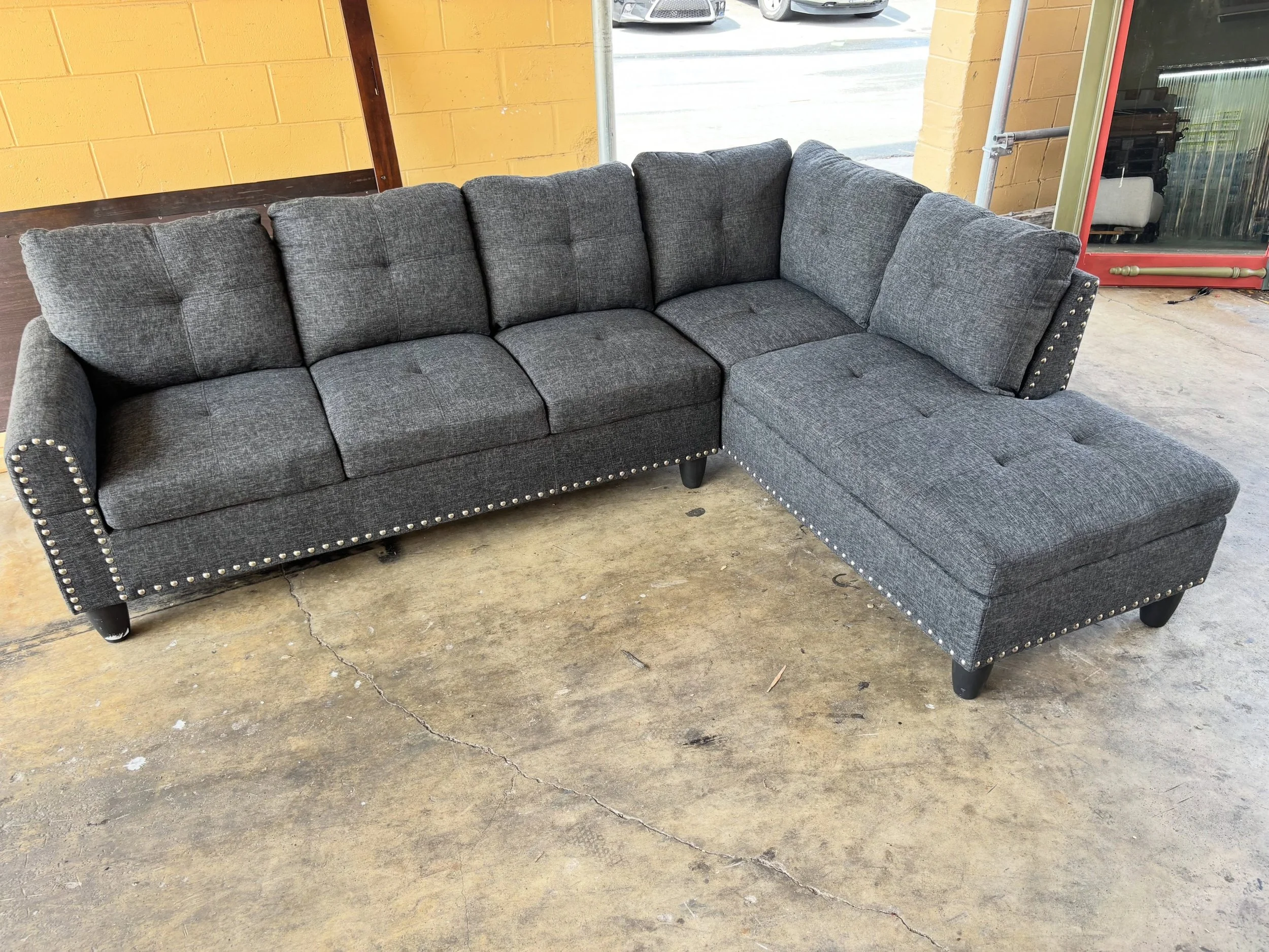 JUST ARRIVED &mdash; another great find at Rhino Decor 🦏

Dark Gray L-Shape Sectional with Nailhead Trim
✅ Good Condition
📏97.5&rdquo; x 69.5&rdquo; x 30.5&rdquo;D x 23&rdquo;H
💲300

Rhino Decor
📍 13393 W Colonial Dr, Winter Garden, FL 34787
🕙 T