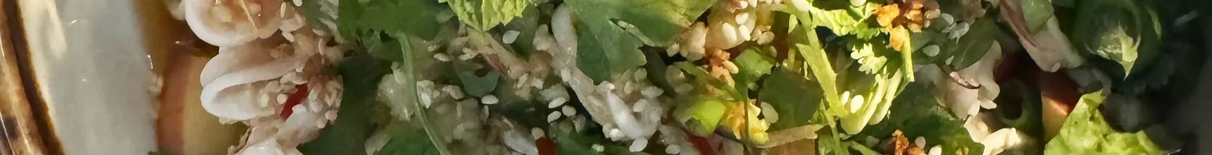 Close-up of salad with lettuce, cauliflower, and other vegetables