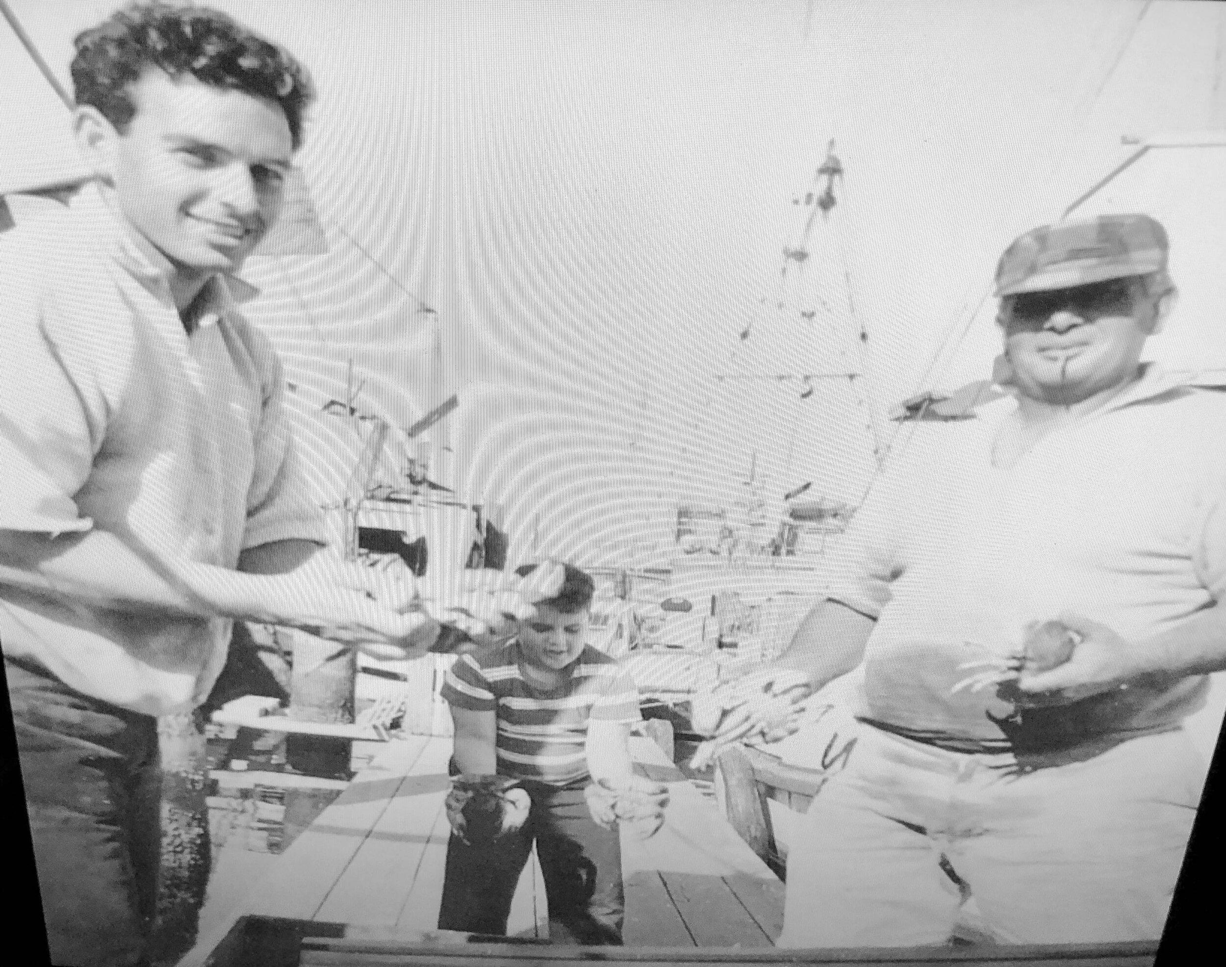 Neil in his early 20s (left) with his father John (right) and cousin Pete Guglielmo, around 1963.