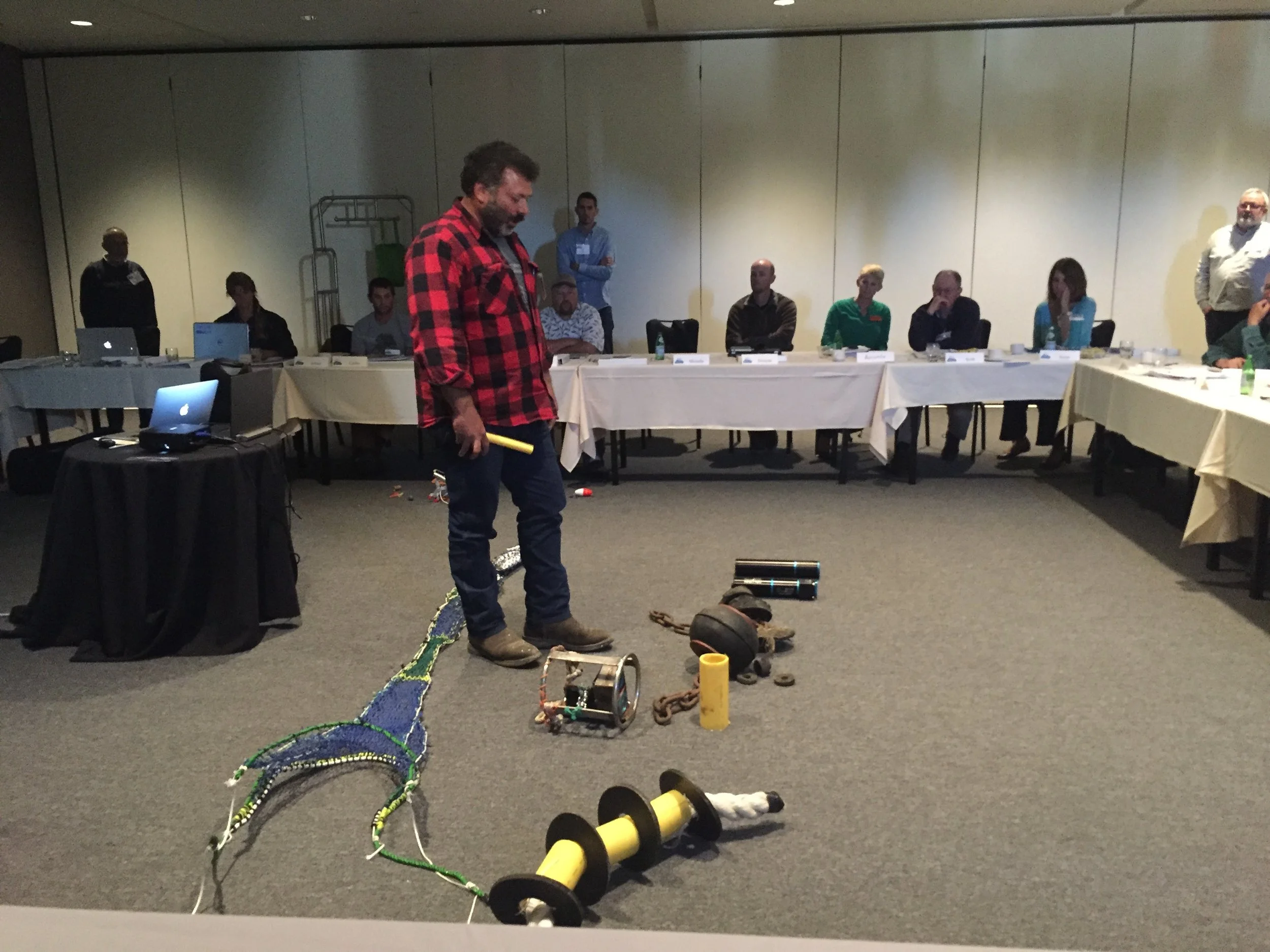 Giuseppe Pennisi, Monterey fisherman, discussing his trawl gear innovations at MREP 2016 in Santa Cruz.
