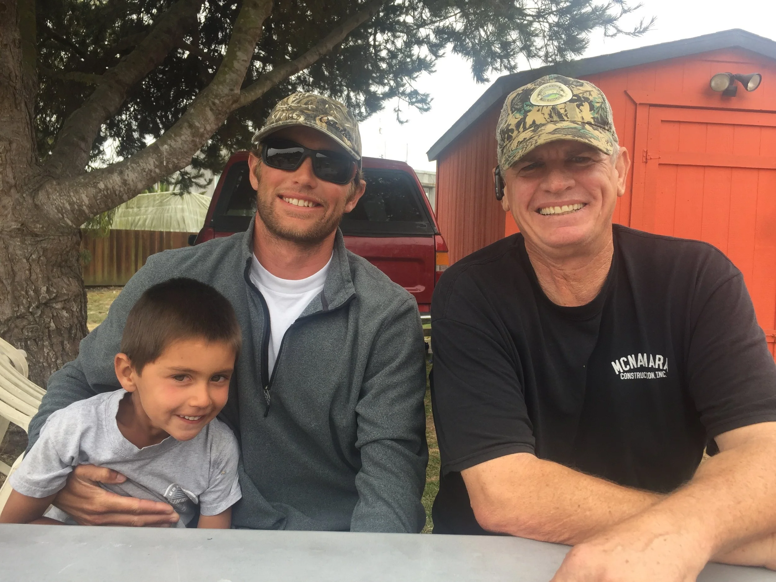 Lost Gear Recovery Team members Calder Deyerle (with his son and deckhand, Miles) and Darryl Donovan.
