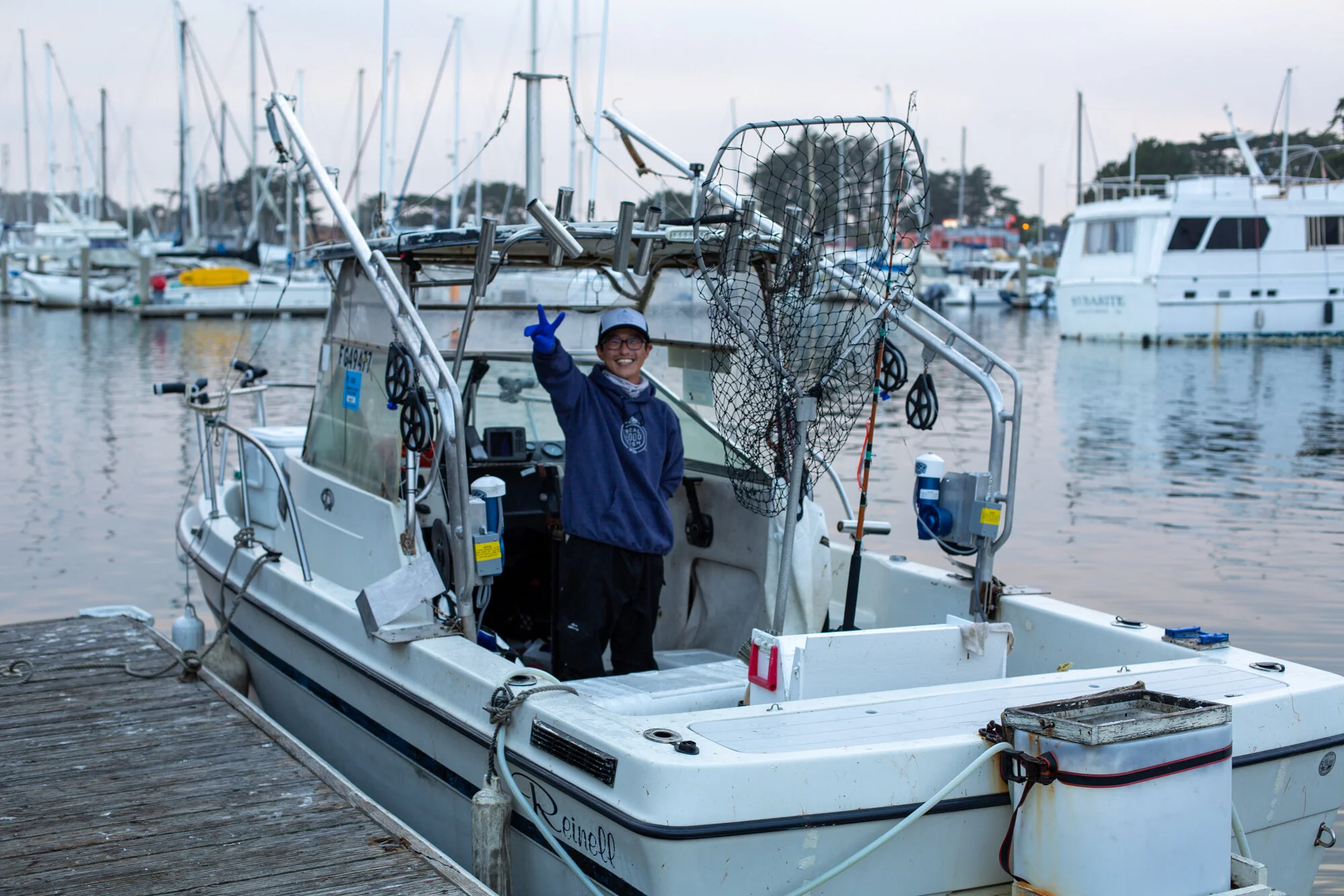 Tuk Yi on his boat after offloading King Salmon in Half Moon Bay in June 2020. Photo: TrimTab Media