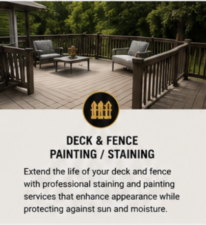 Empty wooden deck with outdoor furniture and safety railing, surrounded by green trees.