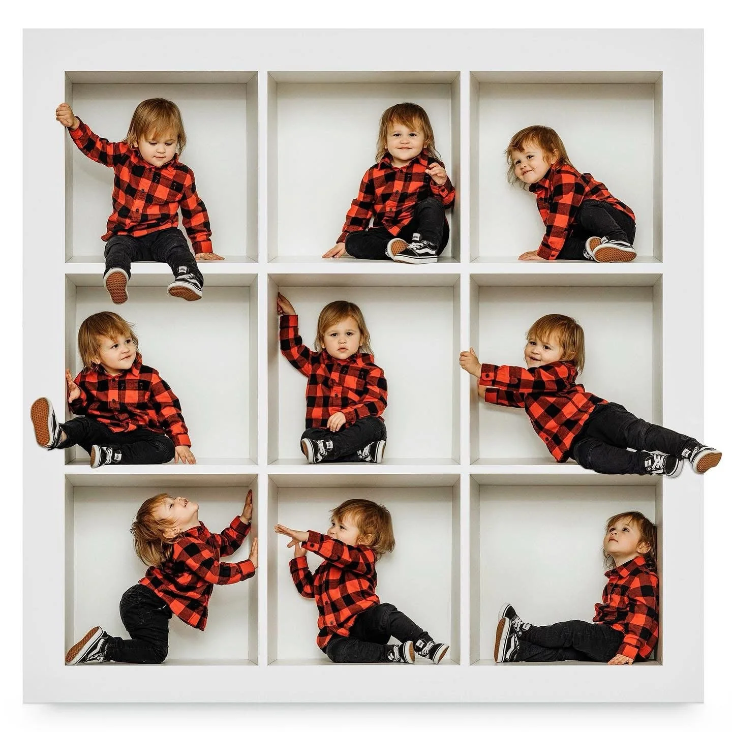 Multiple young children dressed in red and black checkered shirts and black pants, positioned in various poses inside a white cubical grid.
