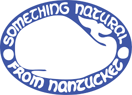 Logo with the text 'Something Natural From Nantucket' surrounding a whale