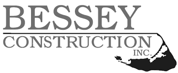 Logo for Bessey Construction Inc. featuring text and an outline of a state or island.