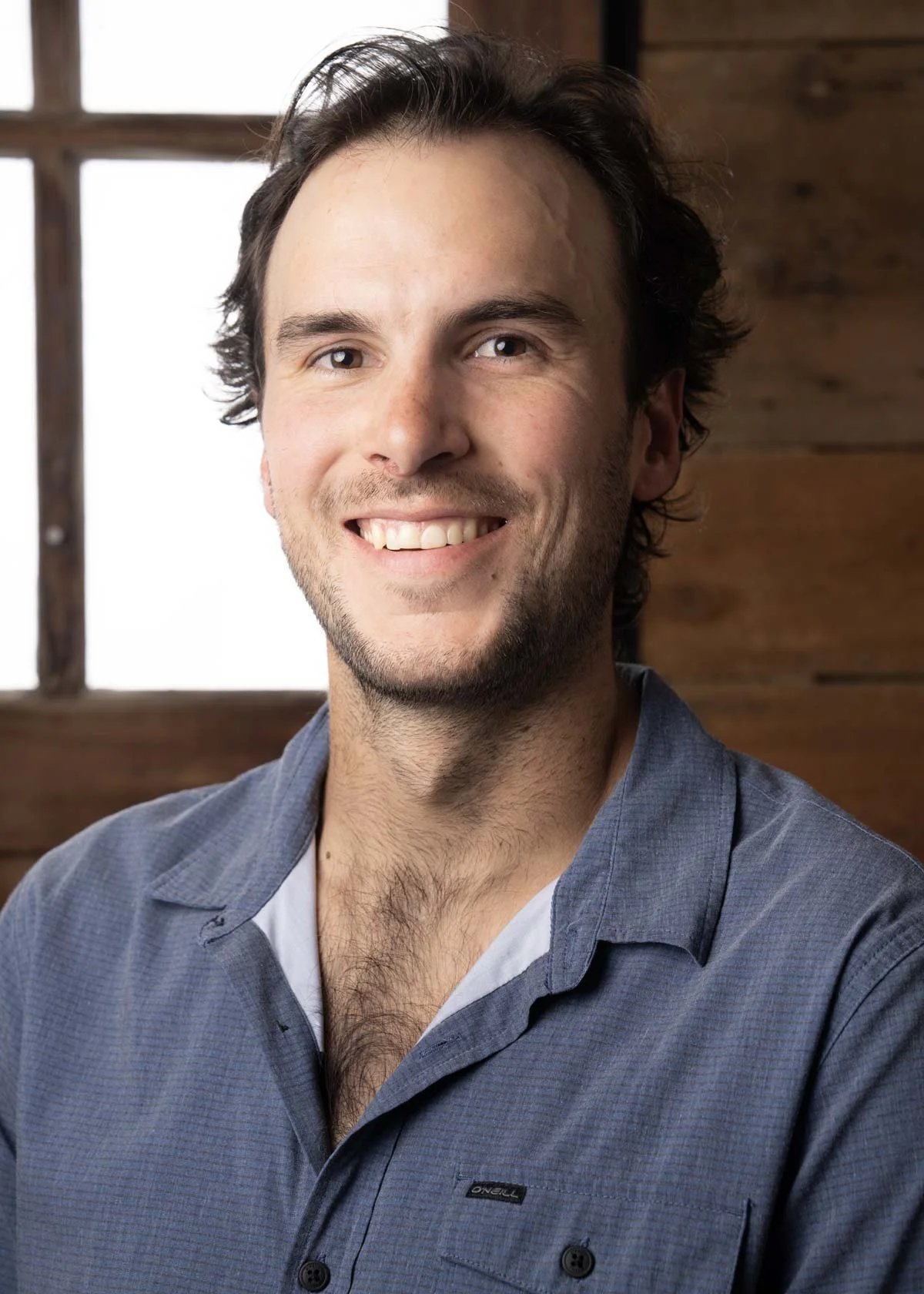 Henry Dickson smiling at camera