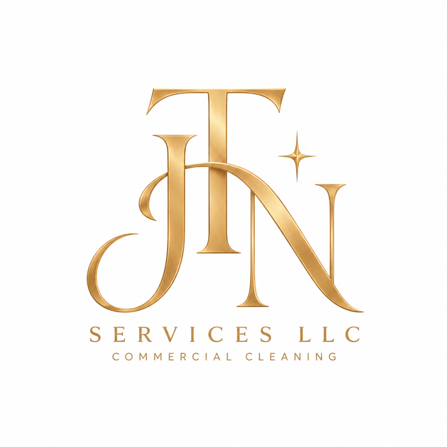 Gold logo for JIN Services LLC with a star and text indicating commercial cleaning services.