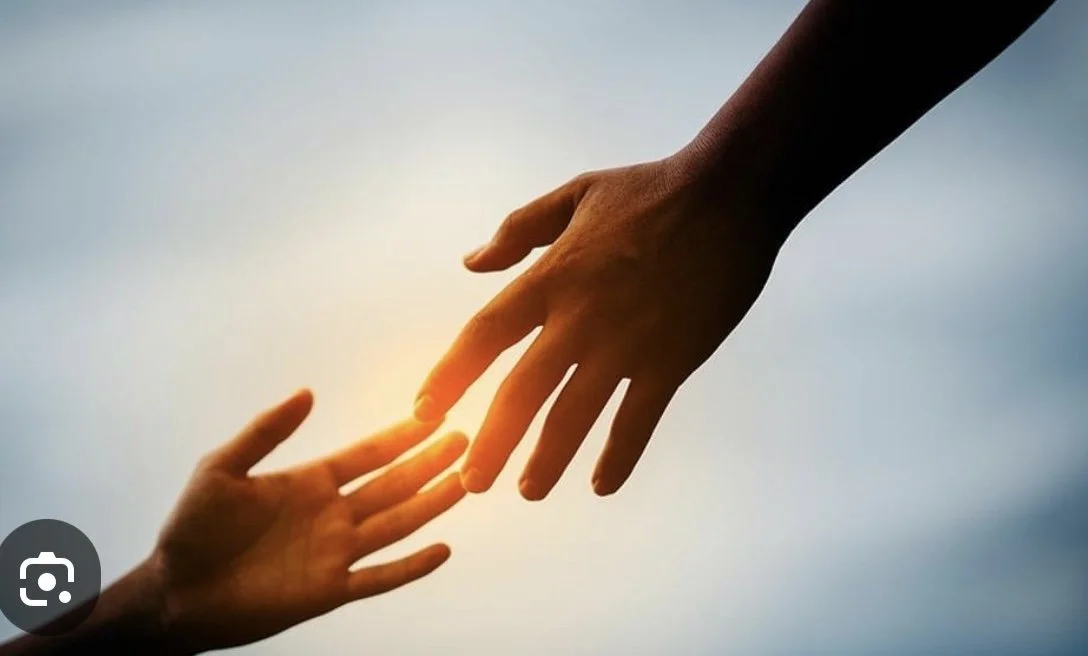hands reaching out for support with Grief and loss in amersham