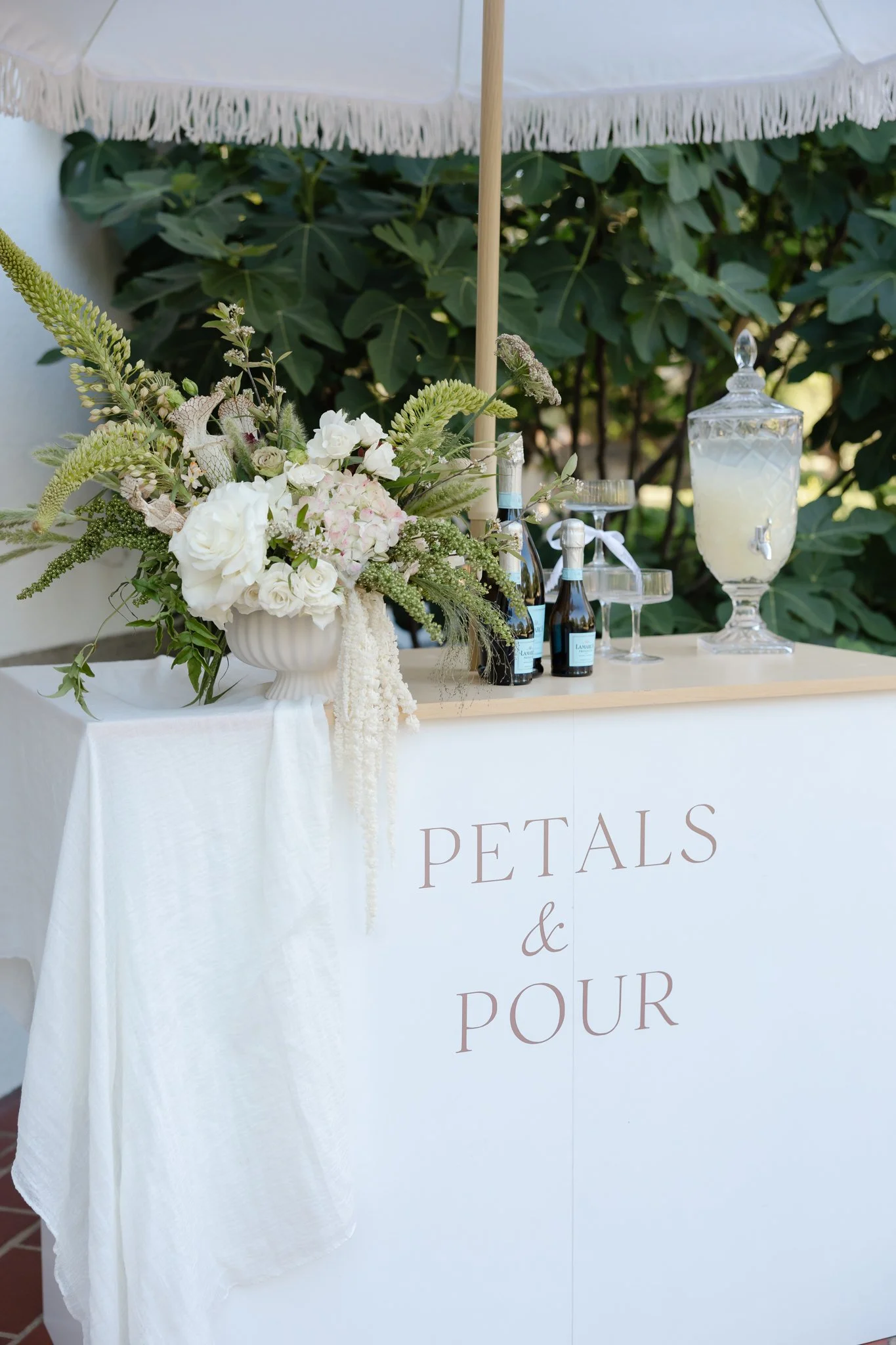 Handcrafted wedding mocktails served from a luxury mobile beverage cart in Raleigh, NC.