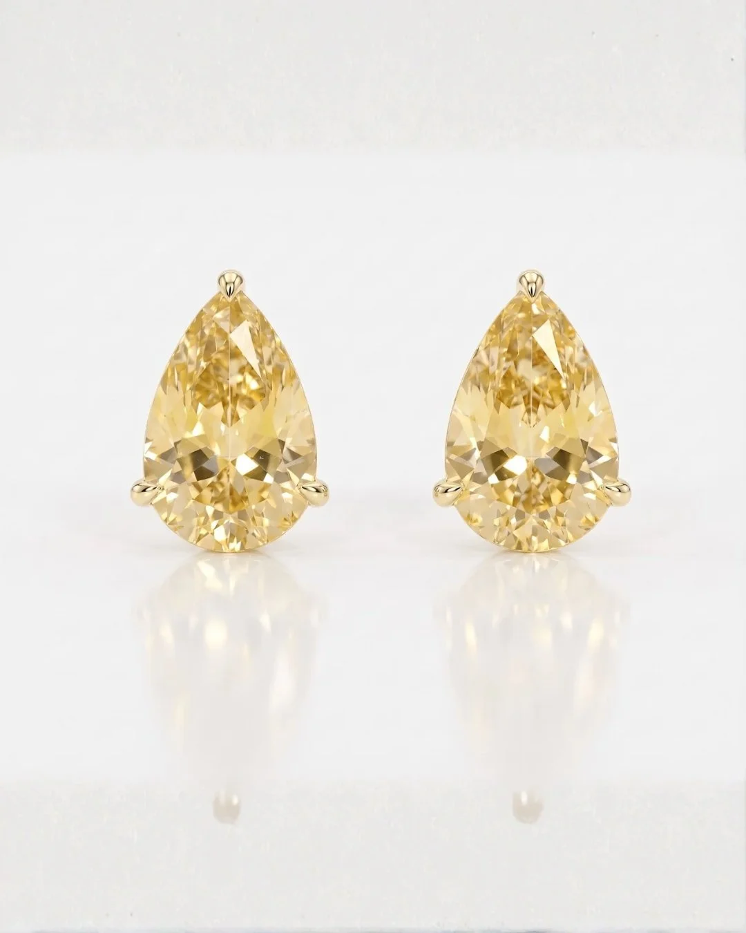 Yellow sapphire earrings in 14k gold
