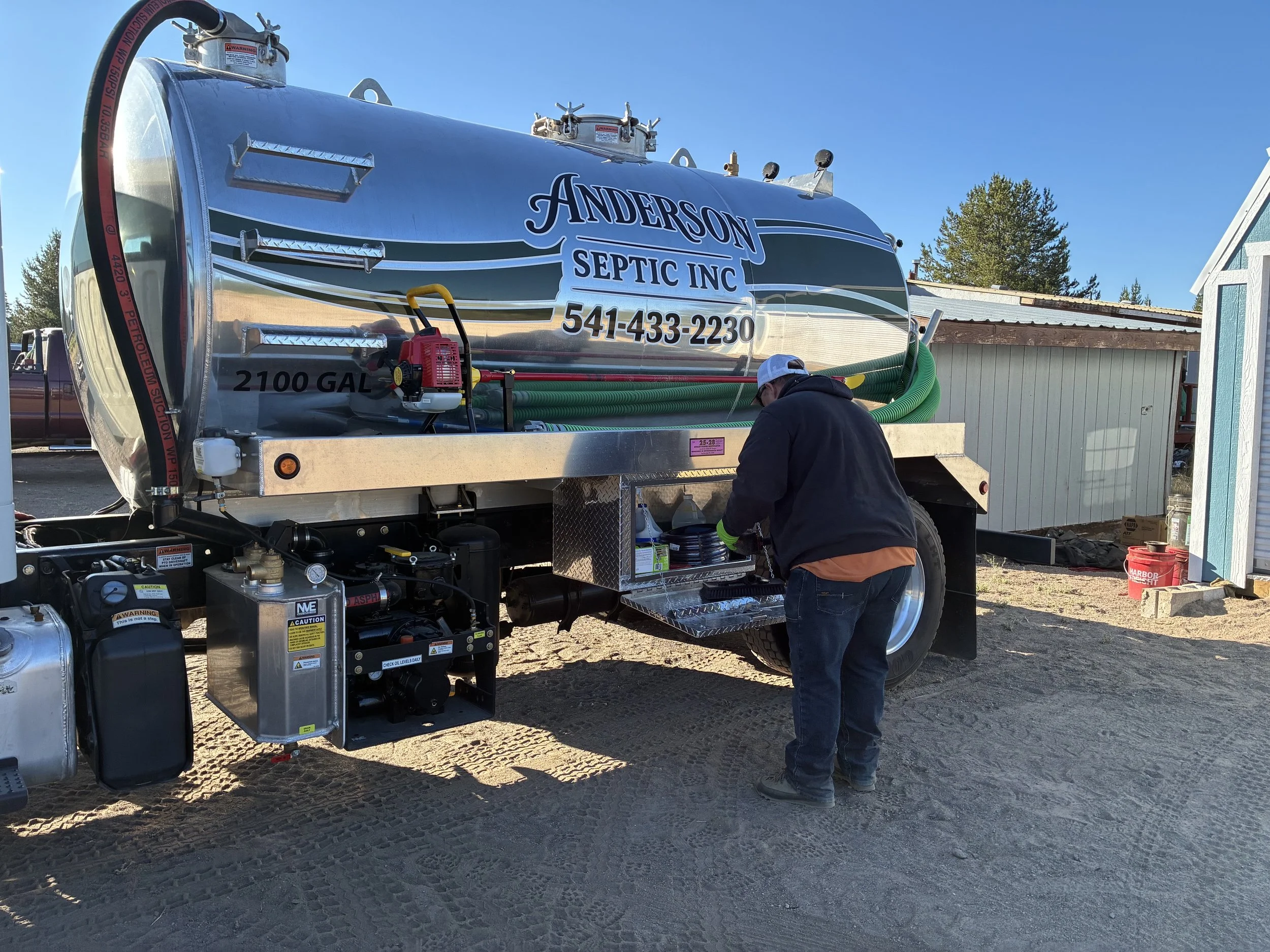 Hard at work... call today for a quote to pump your septic tank!