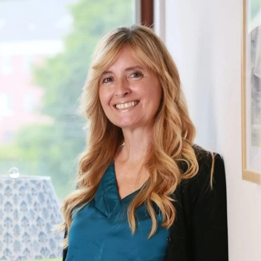 headshot of Trisha Naughton
