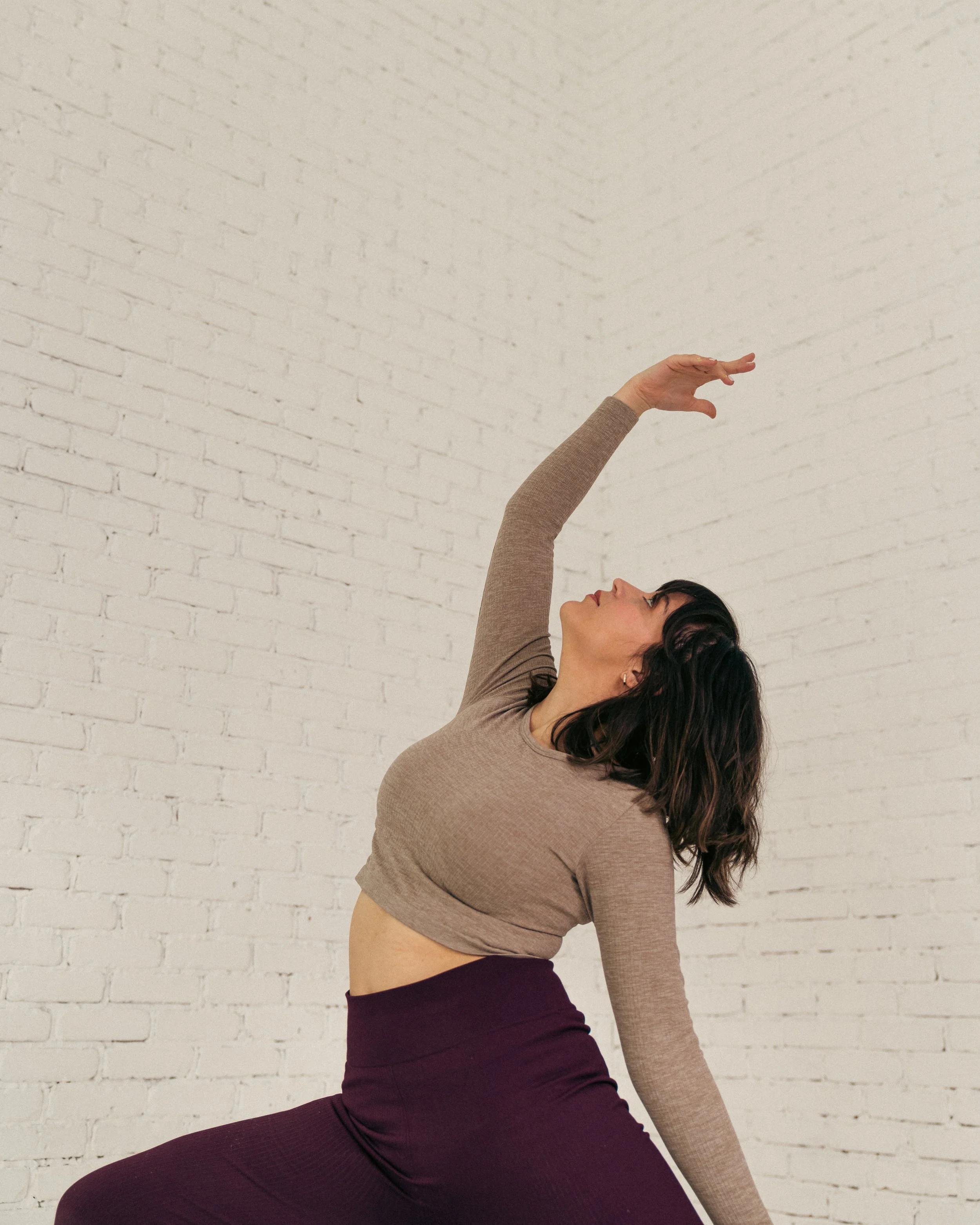 Mayte Alquicira practicing yoga, 500-hour certified vinyasa yoga teacher and founder of The Simmer Project