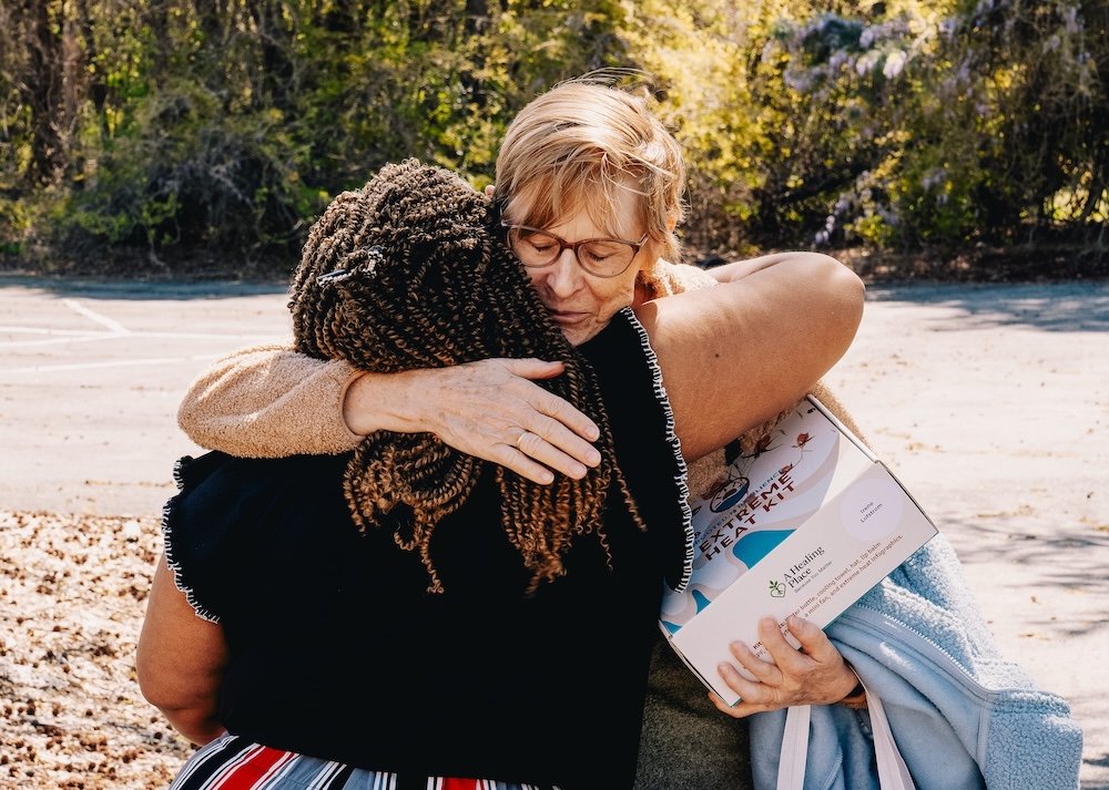 Keshi hugging a workshop participant