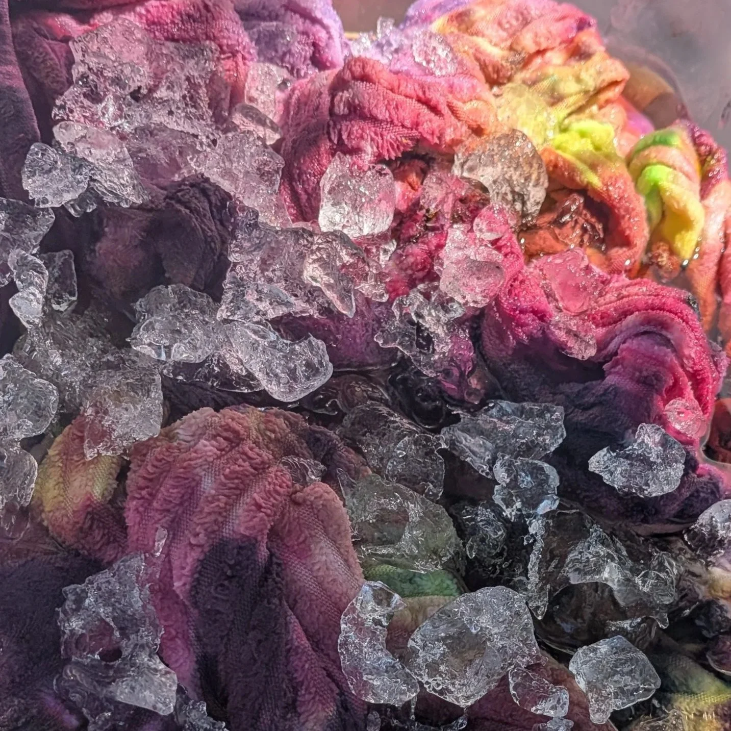 Close-up of in progress ice melting during ice dye process.