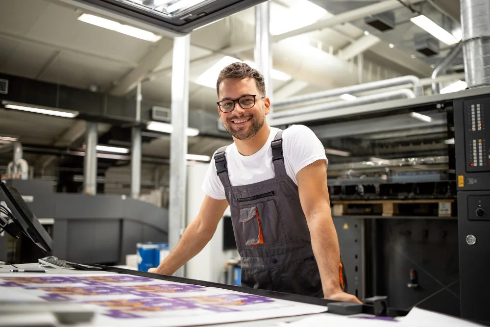 Happy Printer inspecting a printed sheet