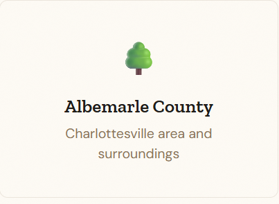 Albemarle County logo with a tree and text about Charlottesville area and surroundings.