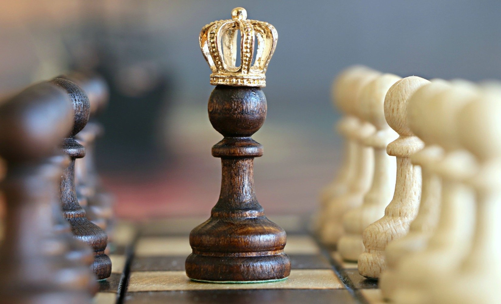 Queen chess piece in centre of board