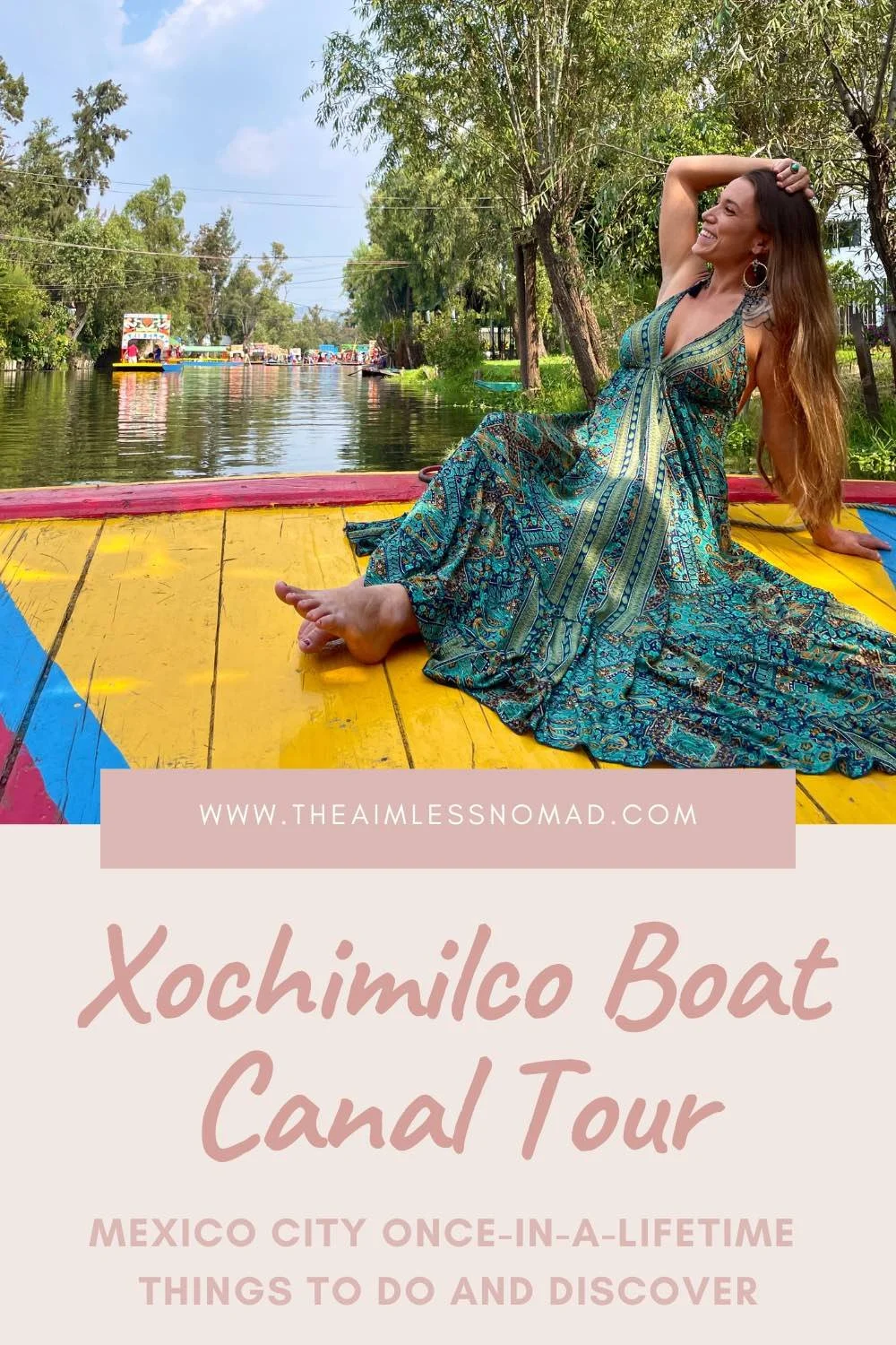 Posing on the front of a trajinera (boat) while floating down the canals of Xochimilco, Mexico City during a tour