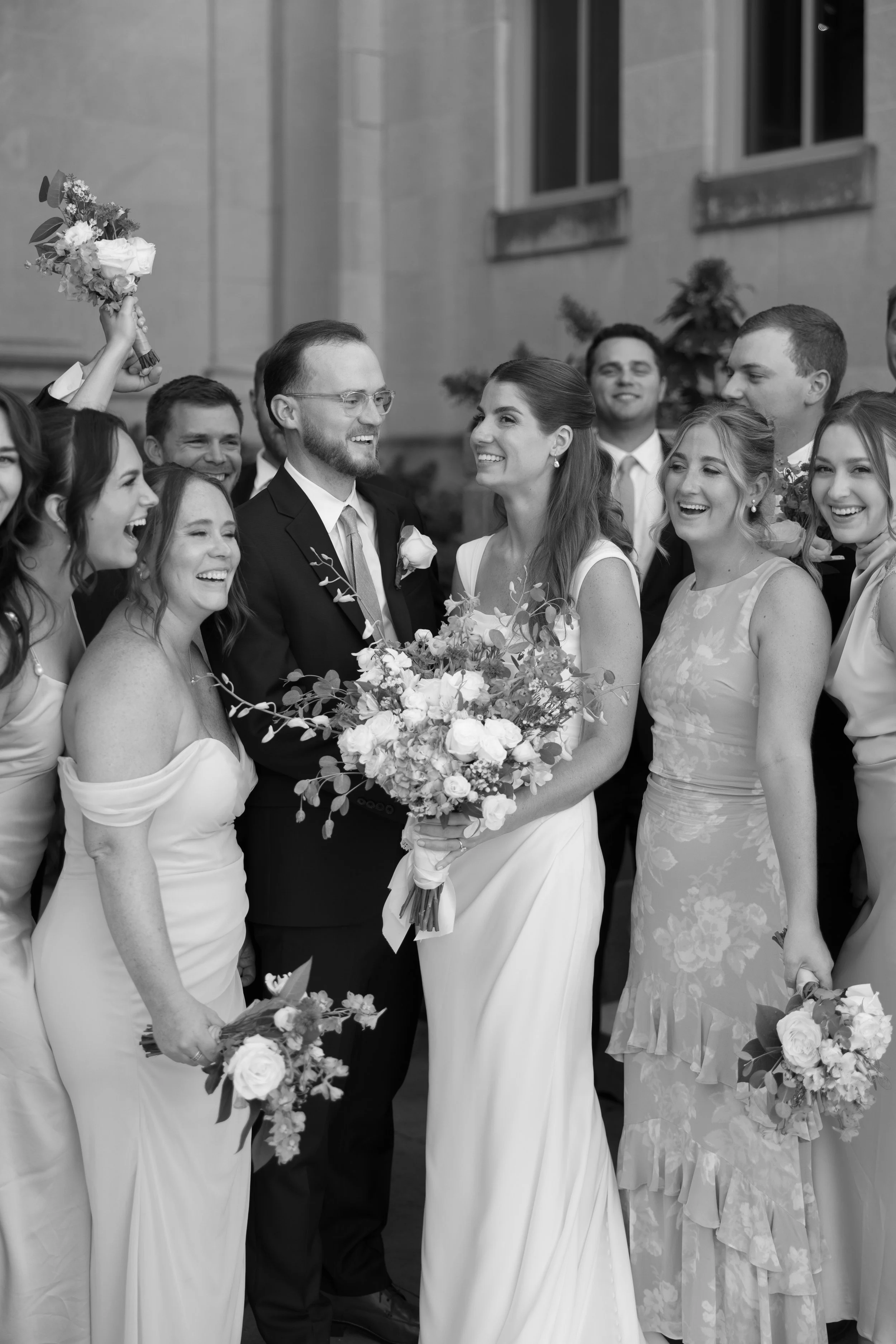 Black and white bridal party after ceremony. 