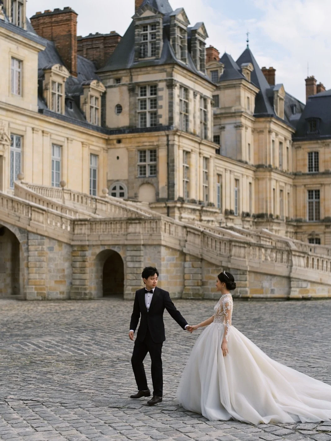 I had the honor of capturing Lynn and Mu&rsquo;s pre-wedding story over two magical days in Paris. This moment was taken at the stunning Ch&acirc;teau de Fontainebleau &mdash; a place that completely stole my heart with its grand architecture and tim