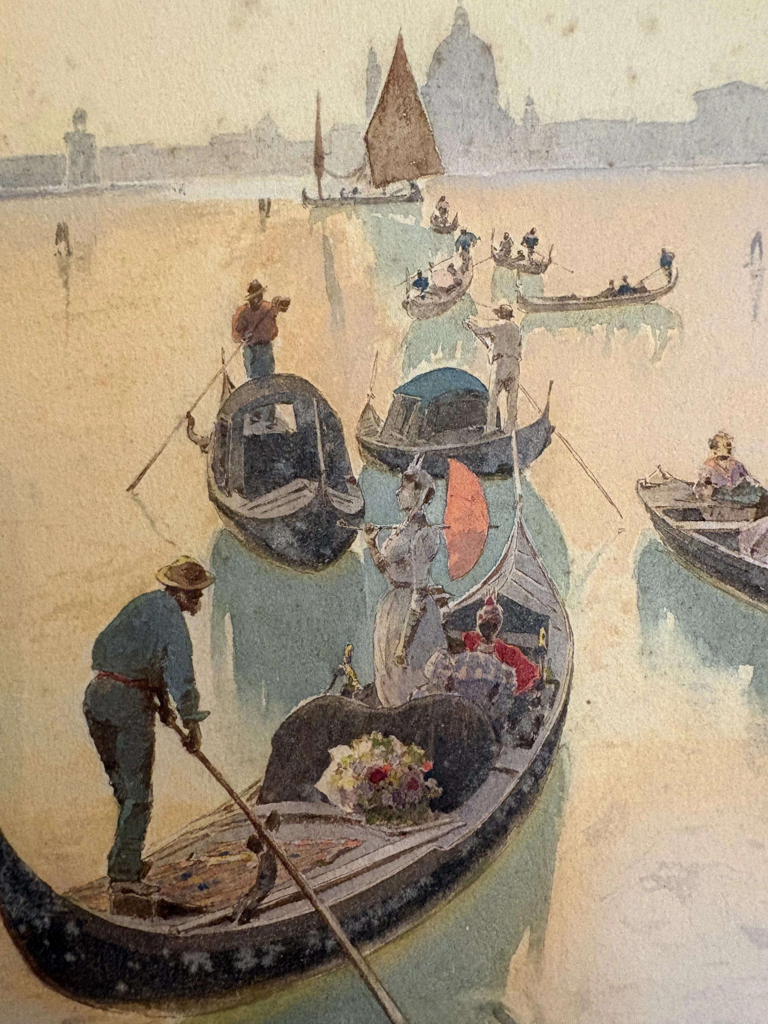 A watercolor painting of a gondola with several people on a canal, with buildings and domes in the background, and a gondolier standing at the bow.
