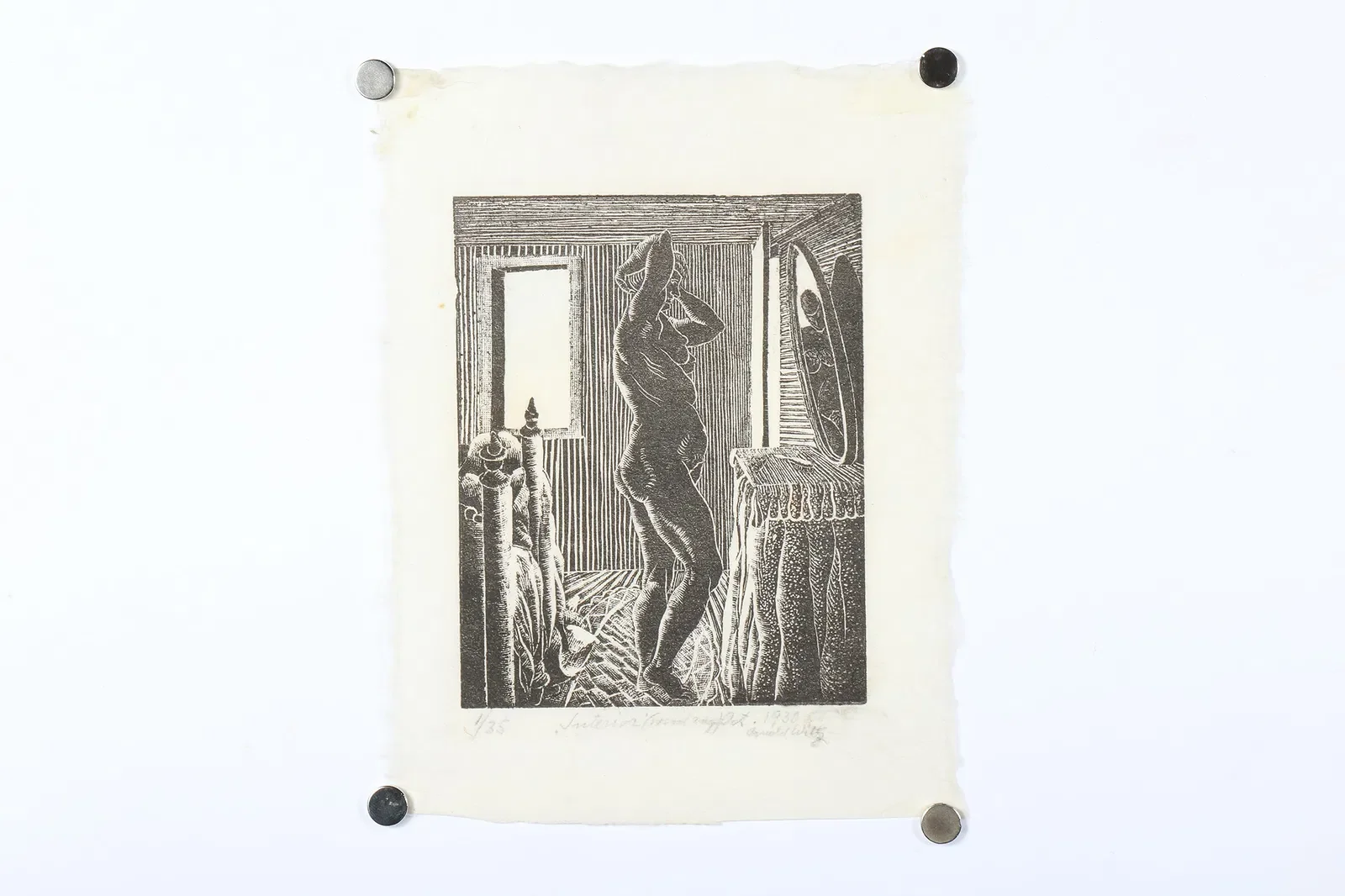 Black and white print of a woman standing in a room, looking in a mirror, with a bed, window, and framed picture on the wall.