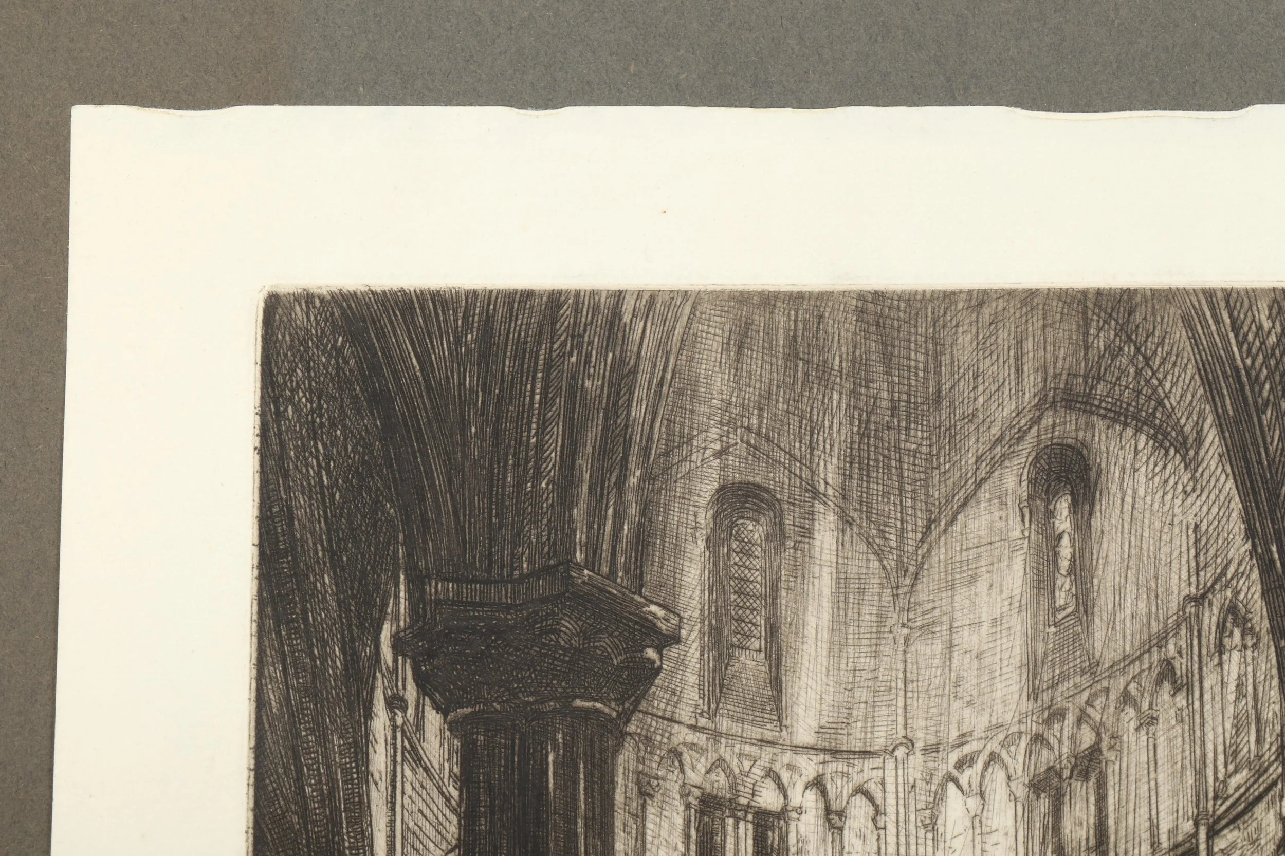 Close-up of a black and white architectural illustration of an interior with high vaulted ceilings and arches, possibly a cathedral or historic building.