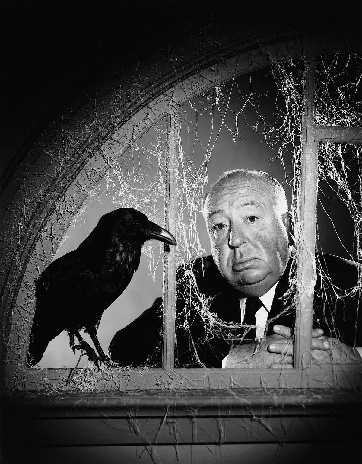 Alfred Hitchcock Presents, Hitchcock posing with a raven.