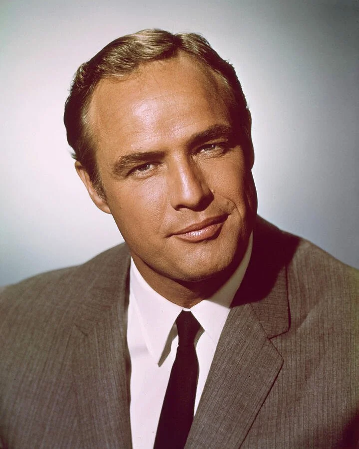 Actor and movie star Marlon Brando in the 1960s, in a suit and tie.