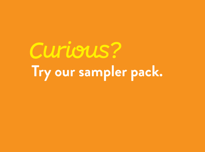 Orange background with yellow and white text that reads: "Curious? Try our sampler pack."