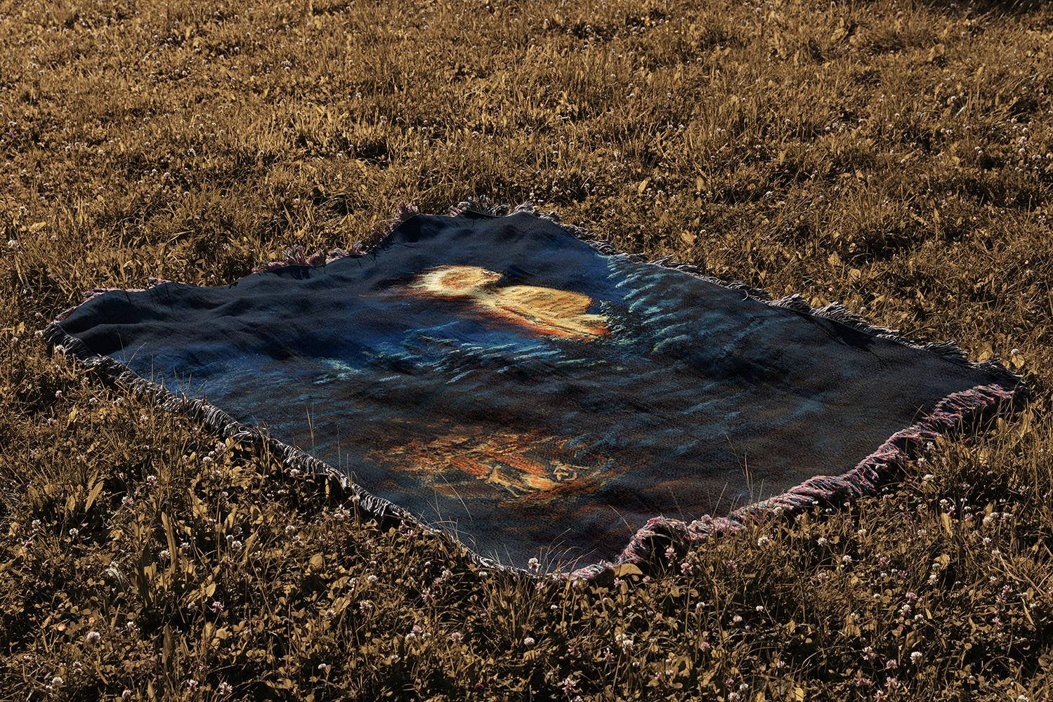 Flaming Skeleton - Blanket on Grass.png