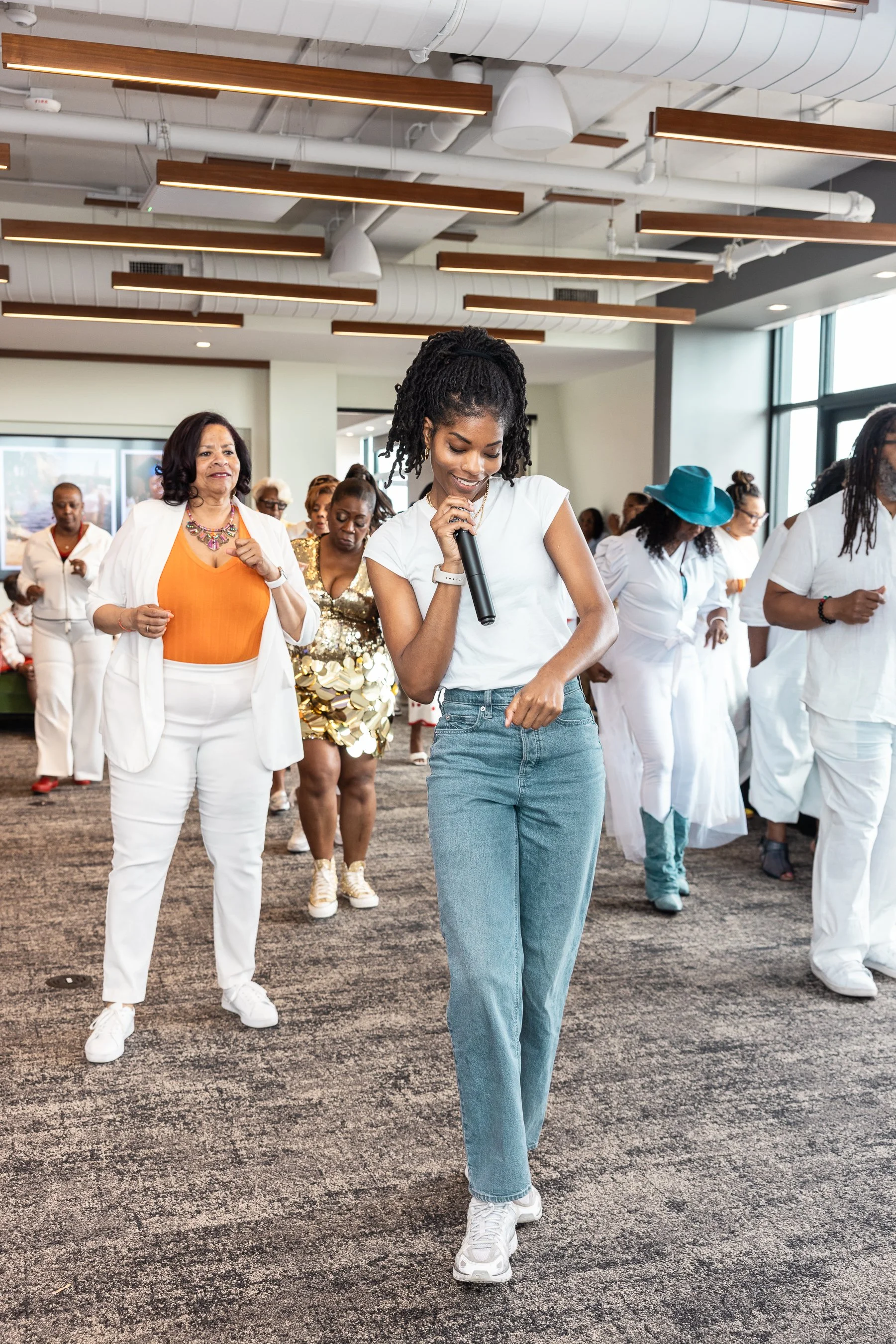 DJ Kyn leading a line dance