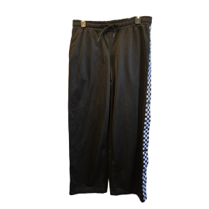 Off the Wall and Onto the Racks: Why These Vans Checkerboard Track Pants Are a Streetwear Essential