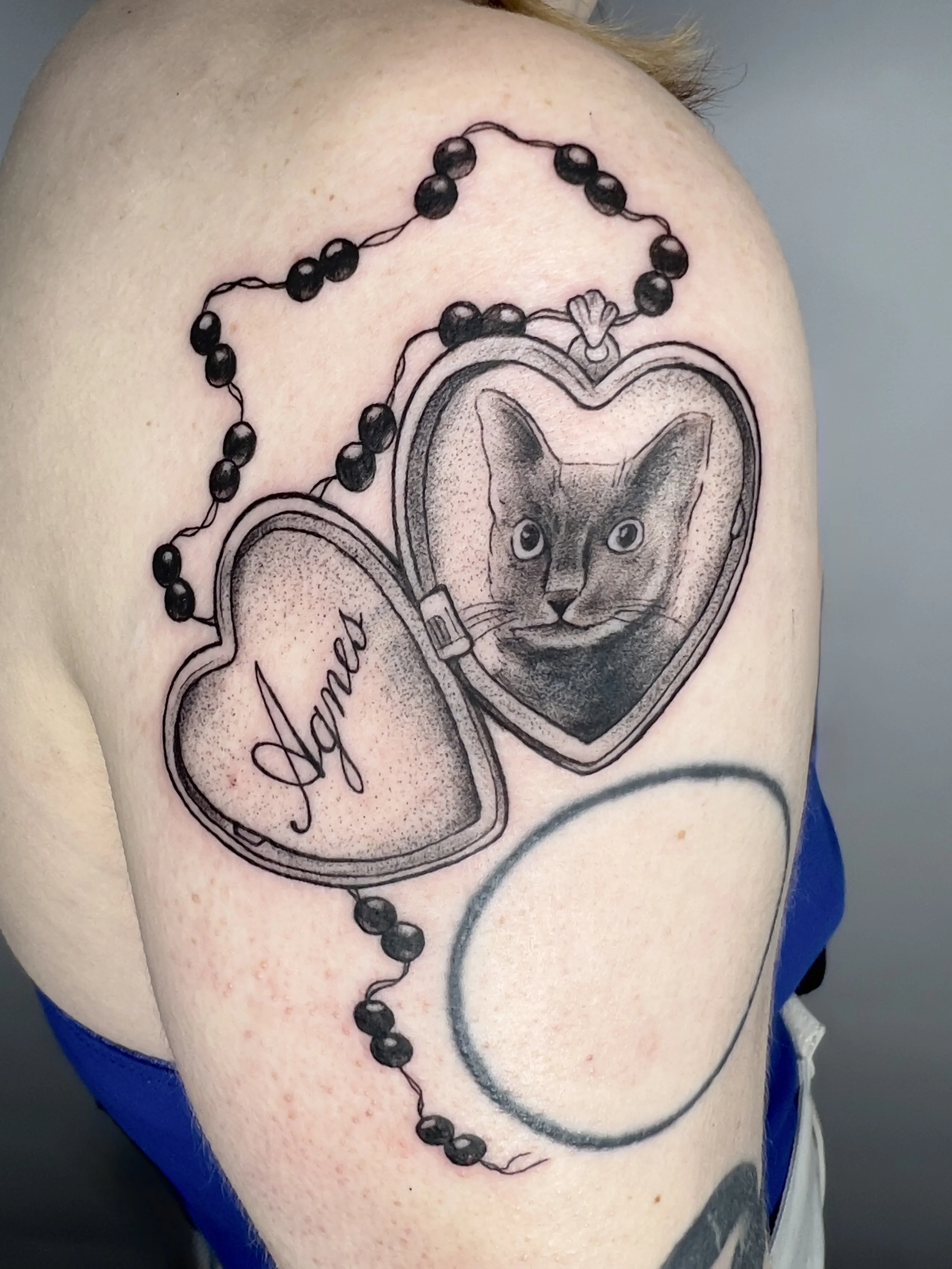 cat locket arm.jpg