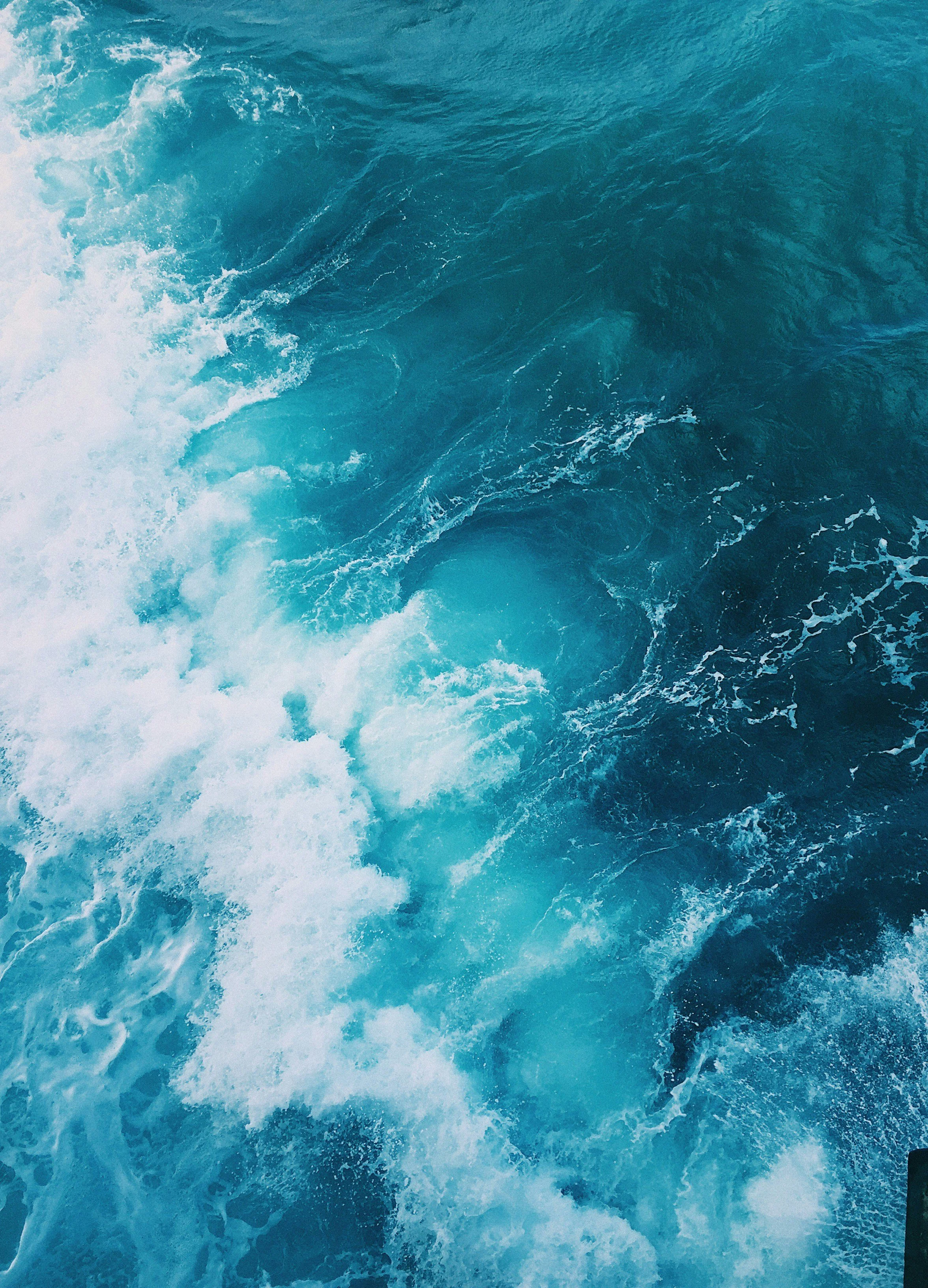 Ocean water with white foam and waves