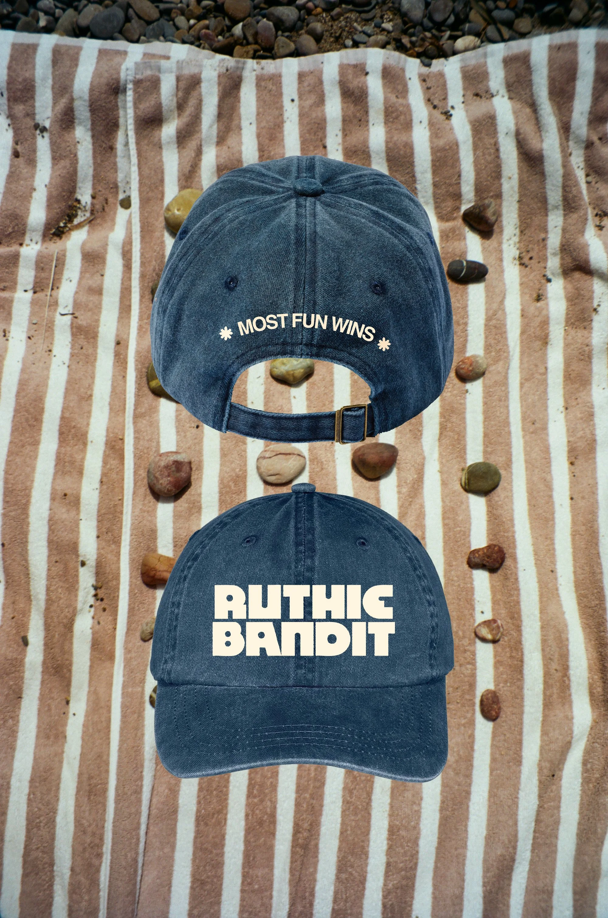 BLUE HAT beach pebbles.jpg