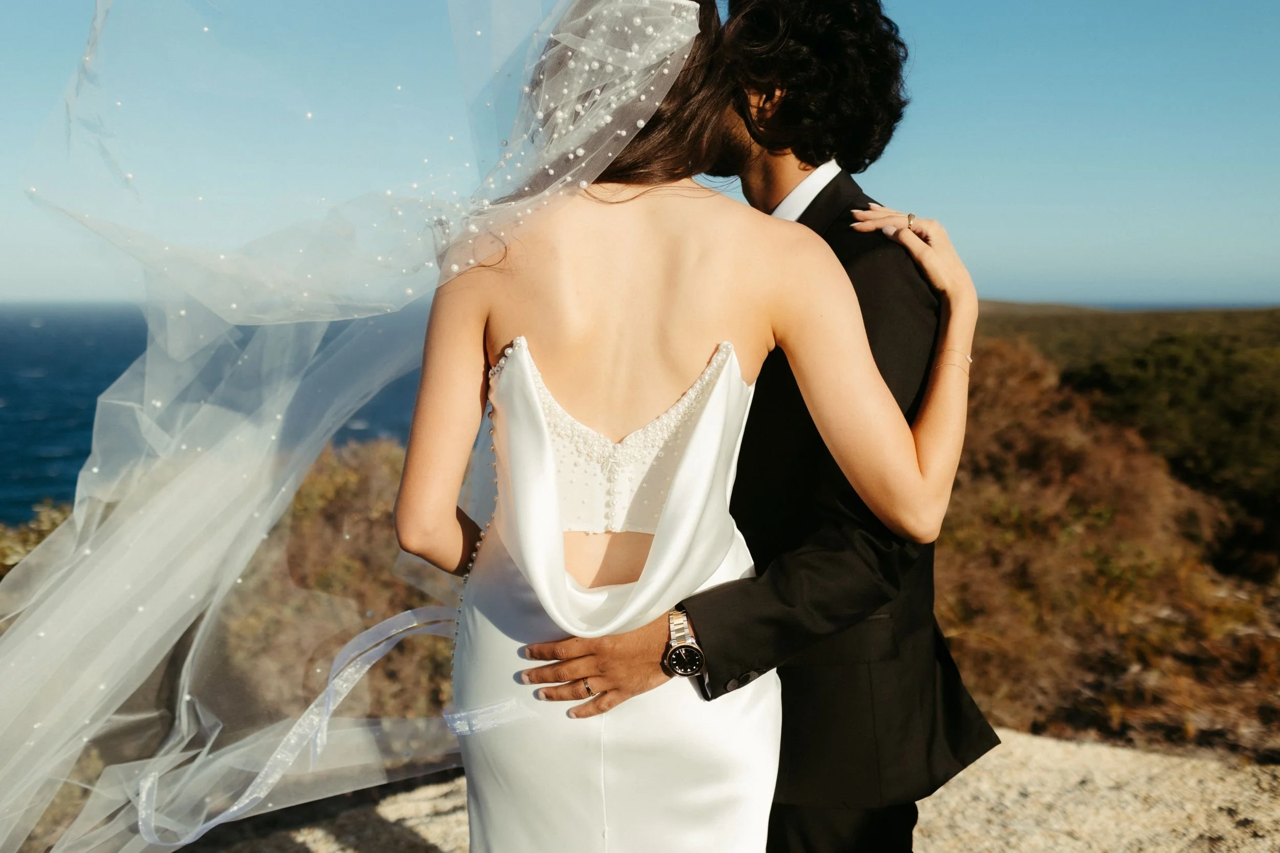 A bride and groom reflecting on their incredible wedding with live music