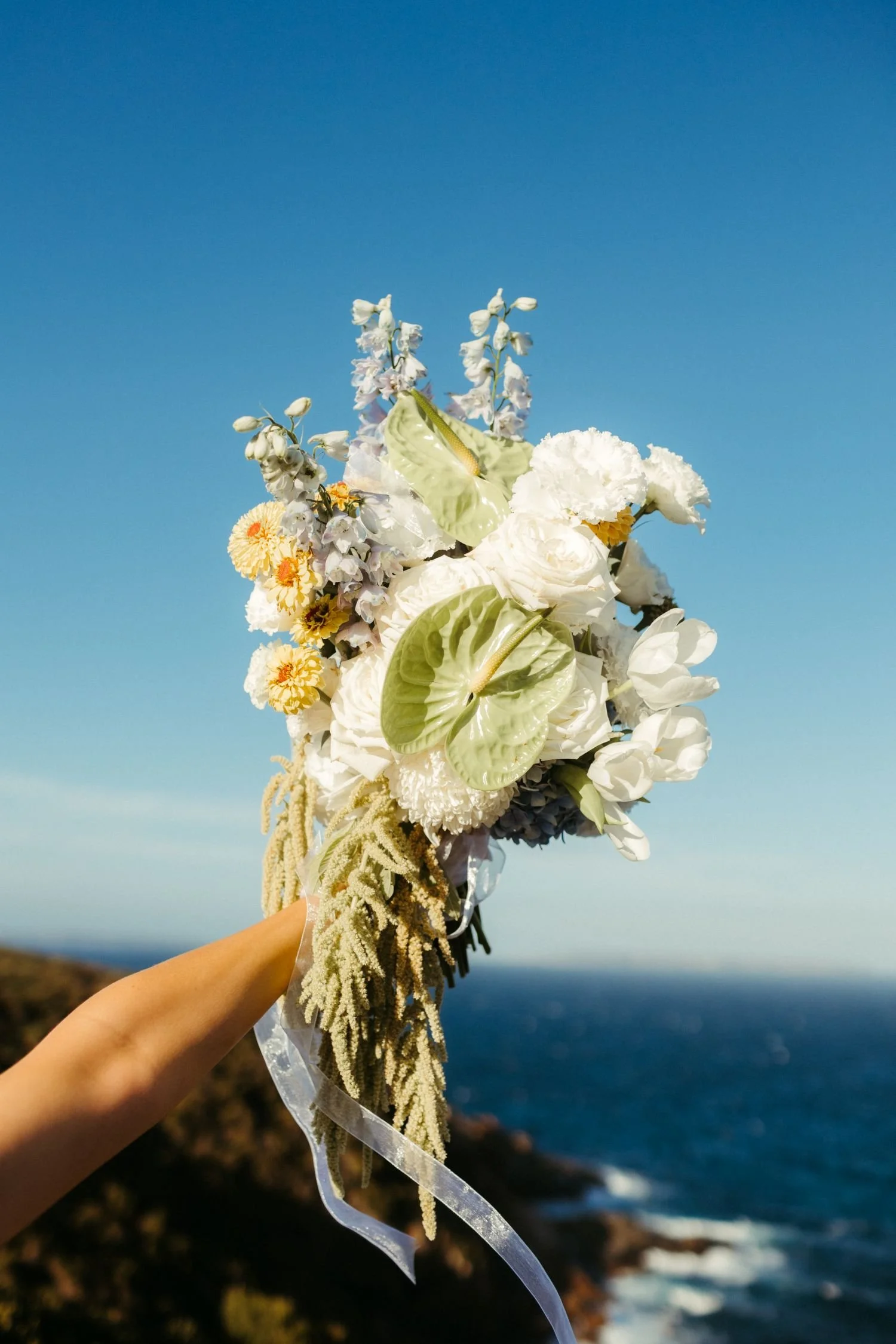 A bridal bouquet by the ocean in Bremer Bay WA