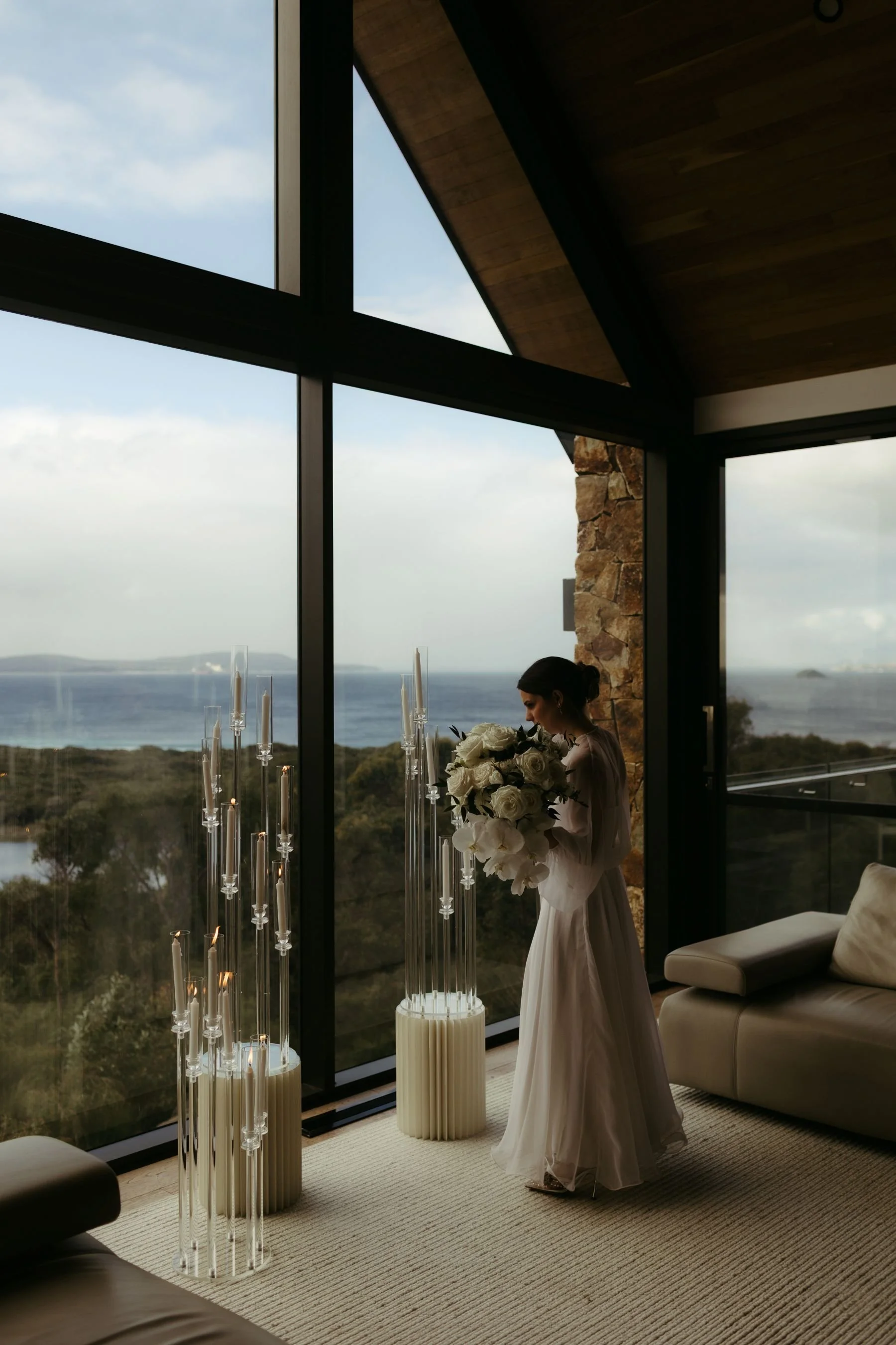 A bride preparring the space for her wedding ceremony musicians at Latitude 355 in Albany Western Australia
