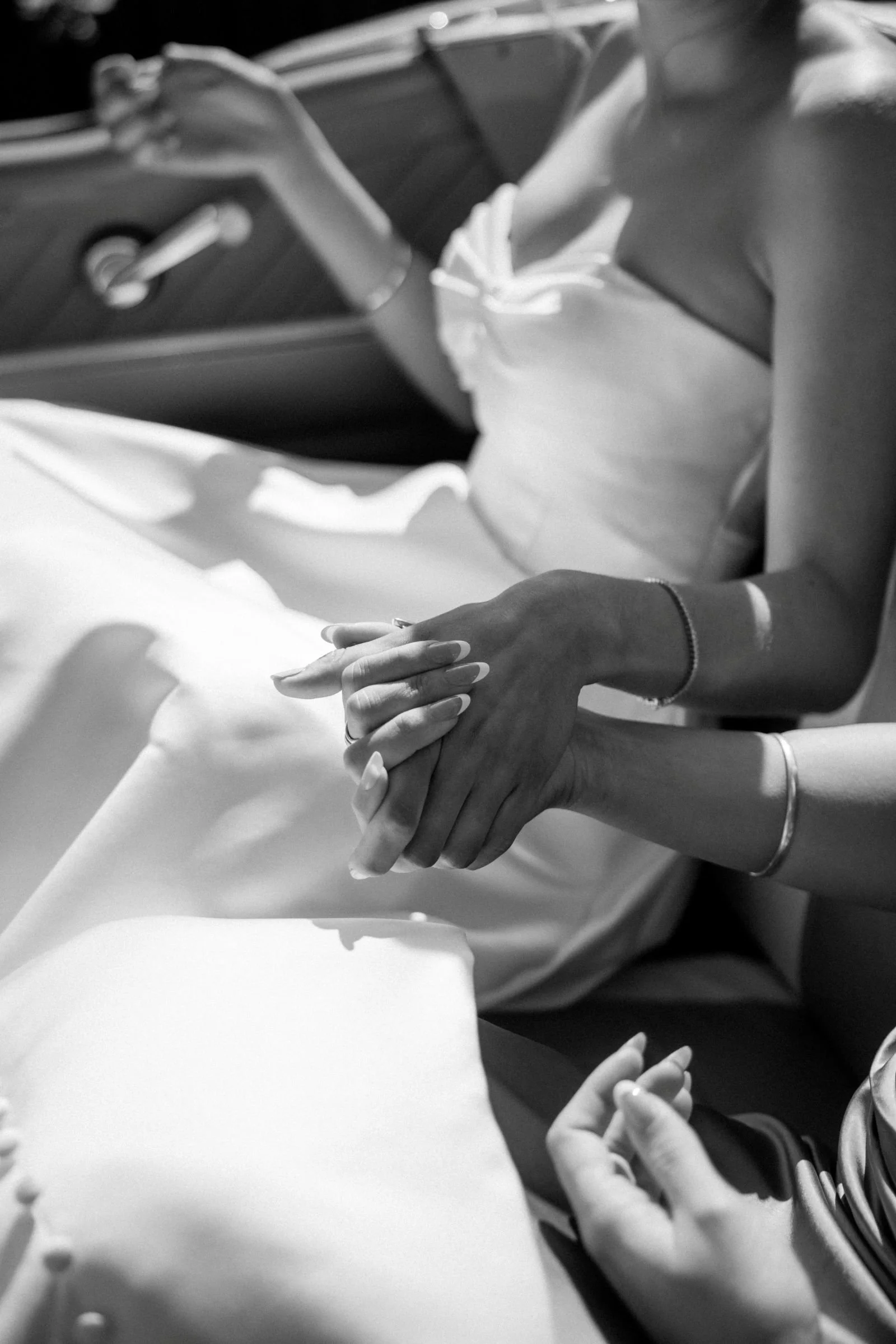 A bride travelling to her wedding in a classic car