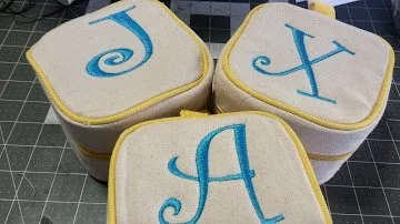 embroidered cosmetic bags with one initial in curlz font